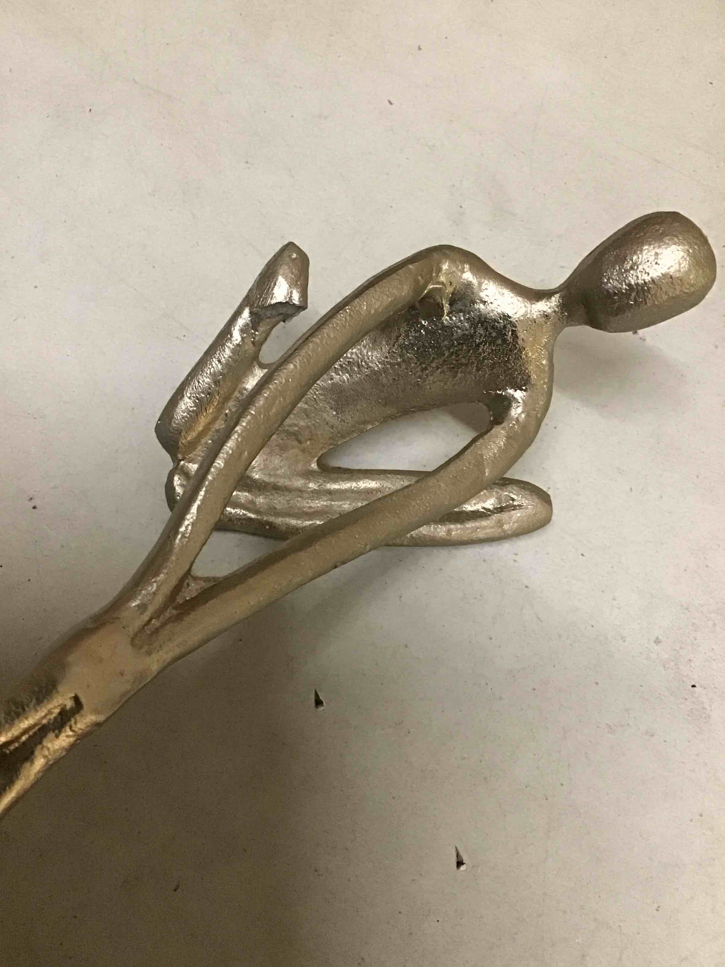 Condition photo showing As Is for ( with one leg broken) Dual Silver Human Figurine