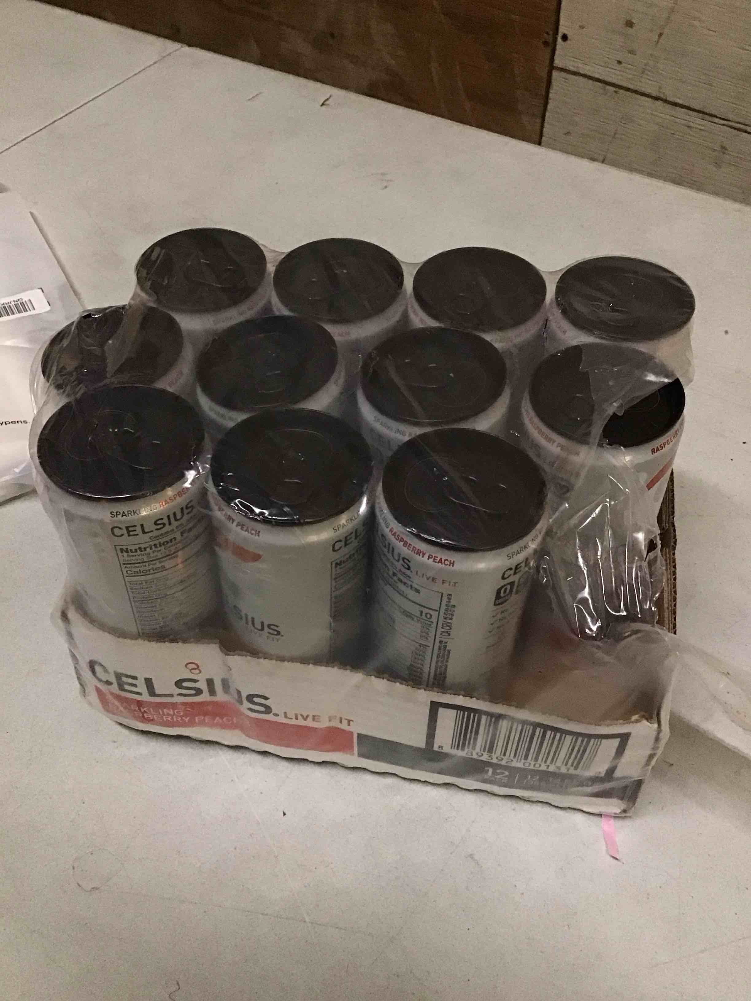 Condition photo showing As Is for ( incomplete 11 pack only ) ( expired date 03/27) CELSIUS Sparkling Raspberry Peach, Sugar Free Energy Drink, 12 Fl Oz (Pack of 12) Raspberry Peach 12 Fl Oz (Pack of 12)