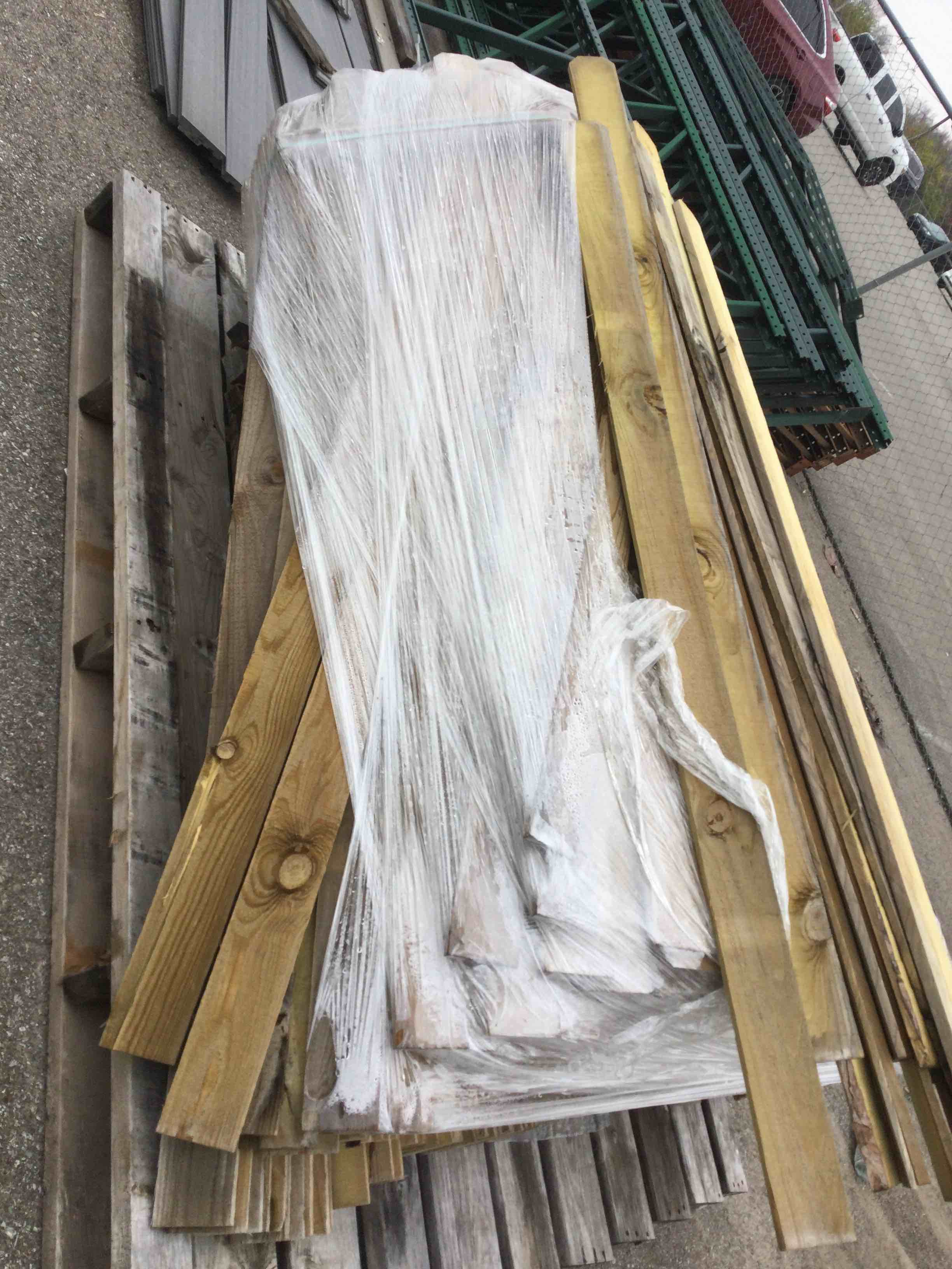 lot of assorted wood fence slats 