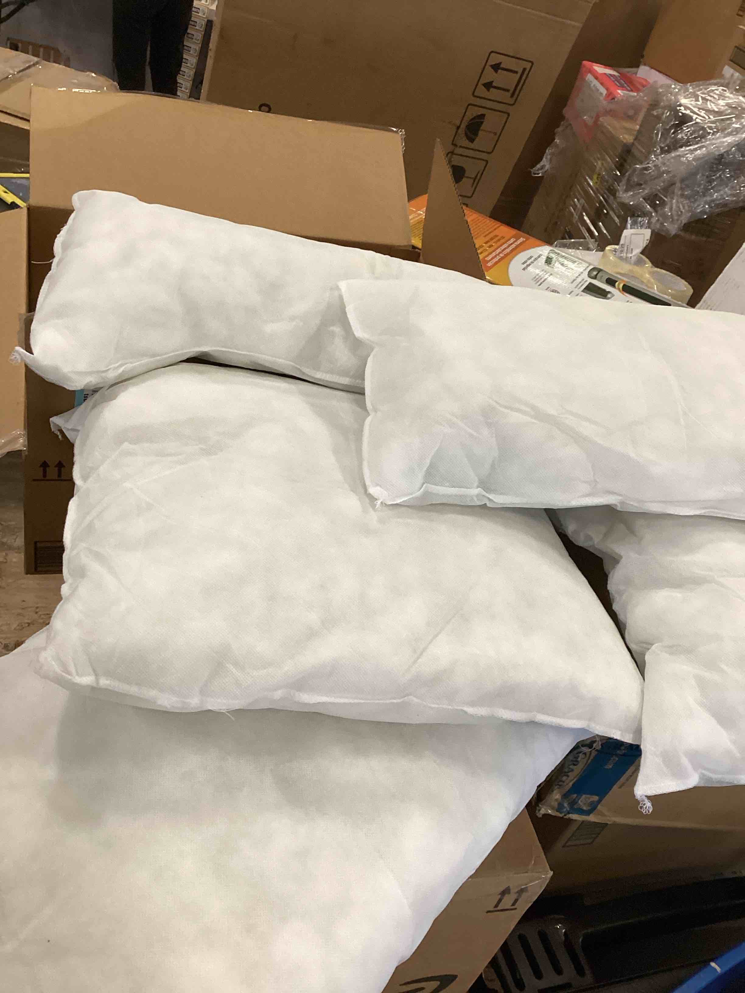 assorted bed insert pillows