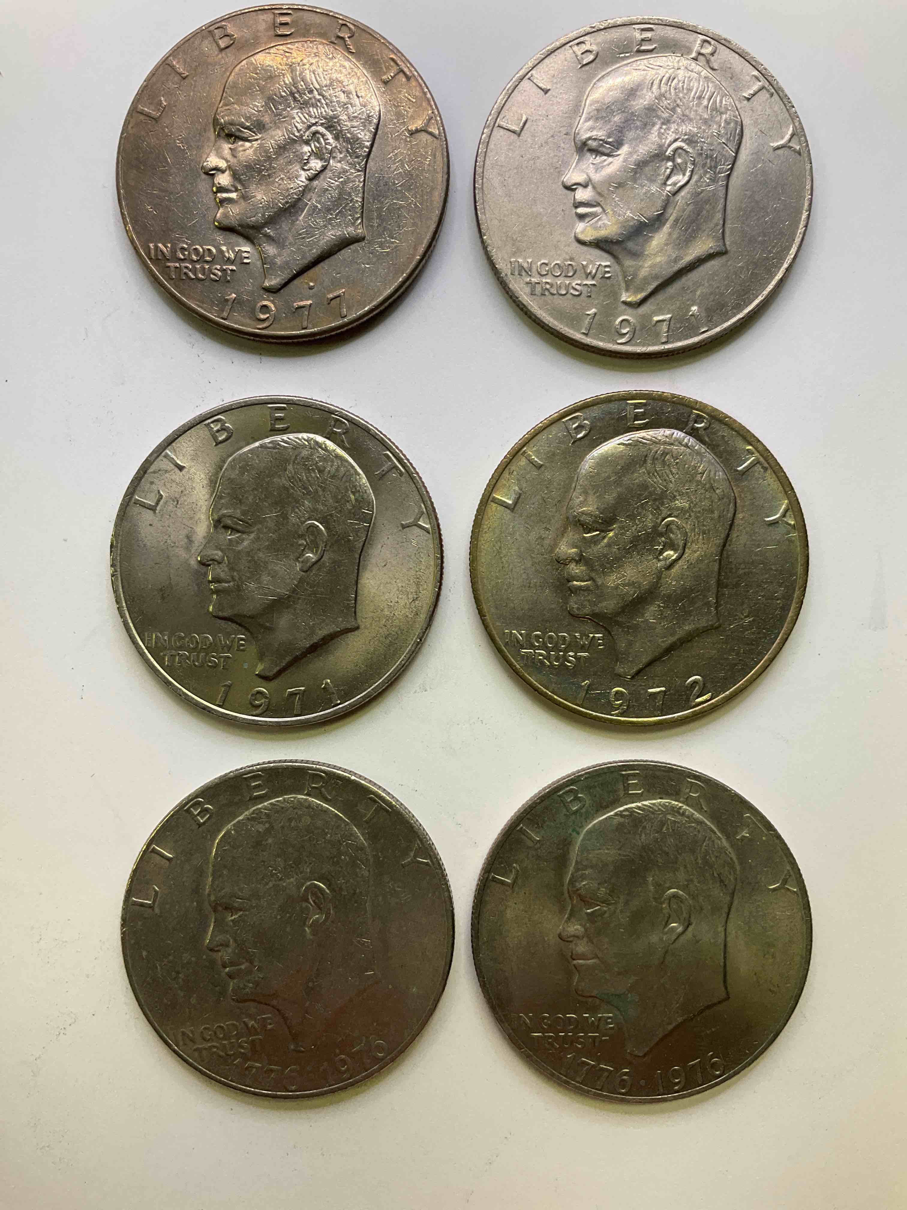 Eisenhower Dollar Coins! These Striking, Large U.S. Coins Were Minted From 1971-1978. Here Are Gorgeous Of Examples Of "Ike" Dollars In Varying Years, Including 1976 Bicentennial. These Coins Have Become Immensely Popular With Collectors & Some Have Great Toning!