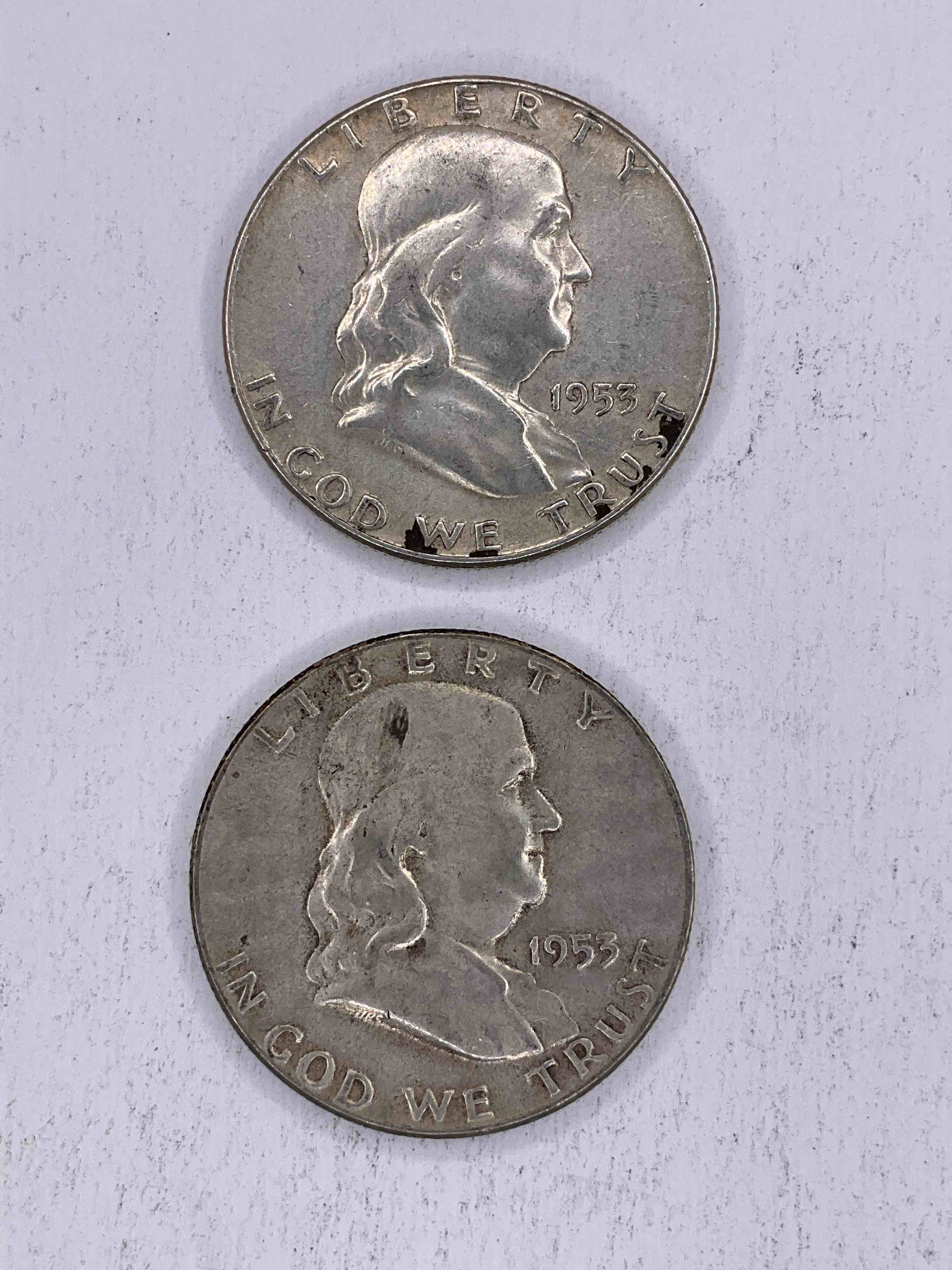 Ben Franklin Silver! Rare 1953 P Mint! Before 1965 American Half Dollars Were Actually Silver, Here Are Two Gorgeous Examples Of Rare 1953 Rare Philadelphia Mint Ben Franklin Silver Half Dollars In Nice Condition! Great For Investing In Precious Metals, & 1953 P Is A Very Rare Year/Mint For These Coins! These Heavy Half Dollars Were Minted At 90% Silver and 10% Copper, Giving Them A Net Weight Of .36169 Ounces Of Pure Silver Per Coin! Very Rare In This Condition!
