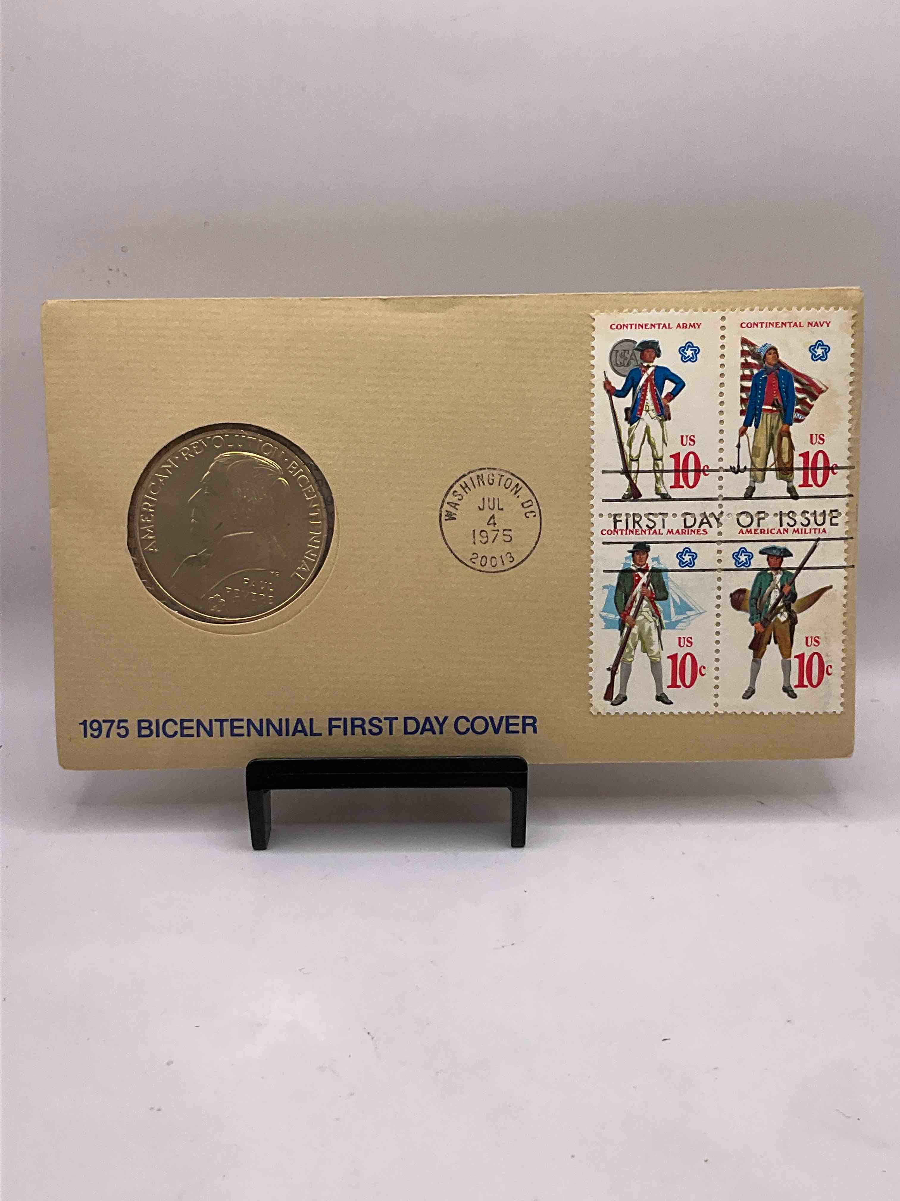 1975 Bicentennial Cool Piece Of History! Check This Out! 1975 (Issued In 1975 In Prep For 1976 200 Year Anniversary Of America) Paul Revere American Bicentennial Commemorative Coin... Still In It's Original Envelope Directly Issued From The U.S. Treasury and Post Marked JULY 4, 1975 FIRST DAY OF ISSUE! This Gorgeous American Revolution Commemorative Coin Is Gold In Color But NOT Actual Gold / Precious Metal. A Cool Piece Of History You May Never Come Across Again! The Shot Heard Round The World!