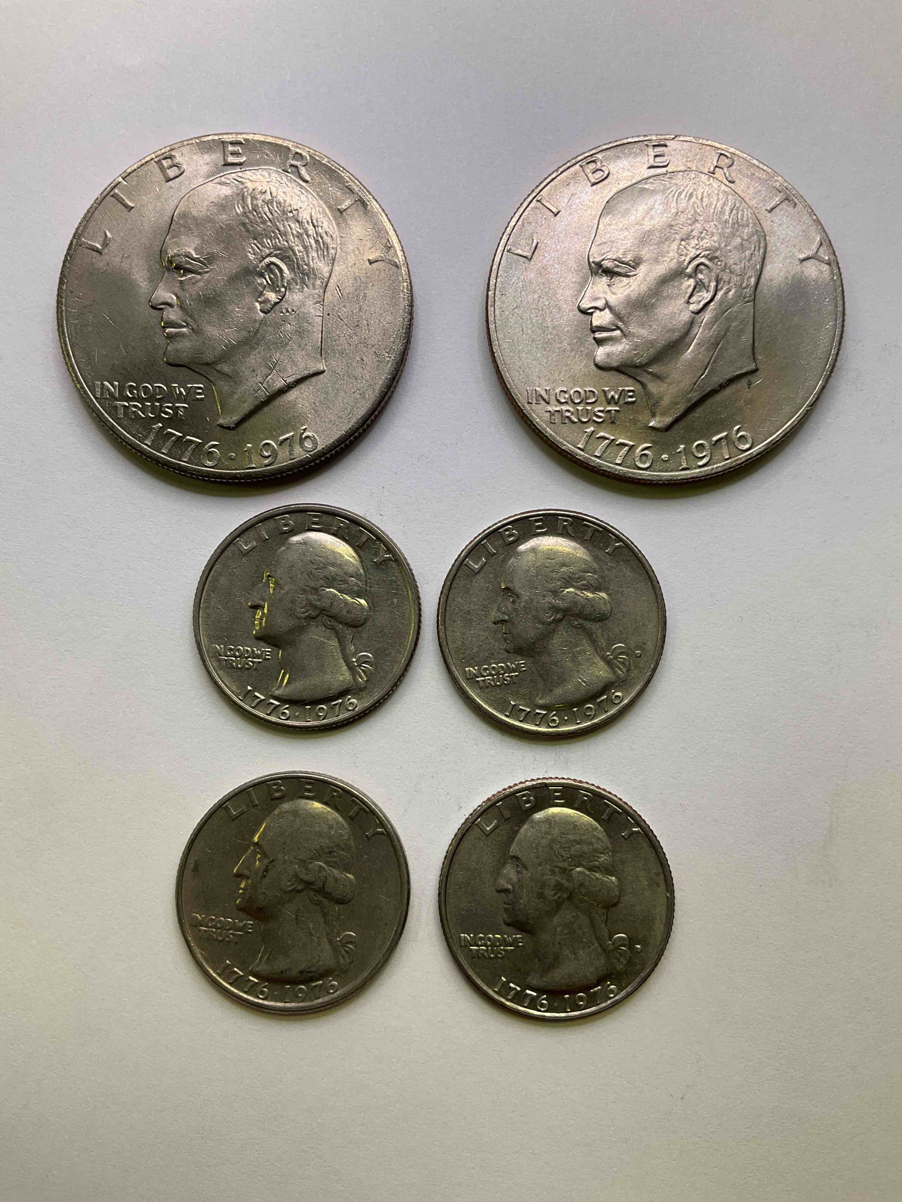 1976 Bicentennial Bliss! In 1976 The U.S. Mint Produced Coins Celebrating The 200 Year Anniversary Of America. Up For Auction Are These Awesome Bicentennial Quarters & Dollar Coins! Dollar Coins Show Great Toning, Highly Desirable For Collectors! Own Pieces Of History & Get Ready For America's 250 Year Anniversary Coming Soon!