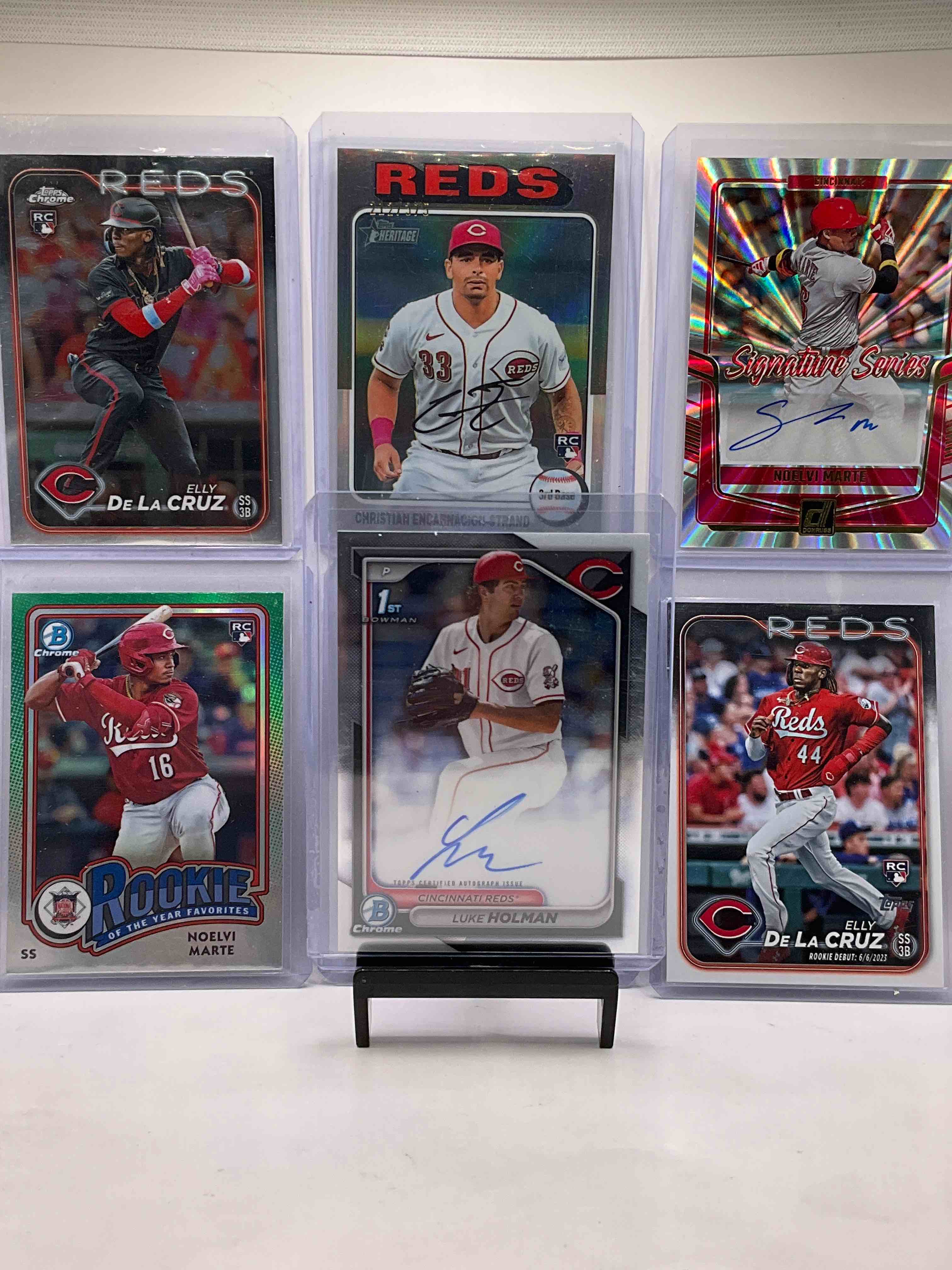 Cincinnati Reds Fans Dream! Two Signed Rookie Cards! Elly De La Cruz Rookie Combo, Luke Holman 1st Bowman Chrome Rookie, Noelvi Marte Signed Rookie & Rookie, Carlos Jorge Rookie & Encarnacion-Strand Rookie! All Mint!