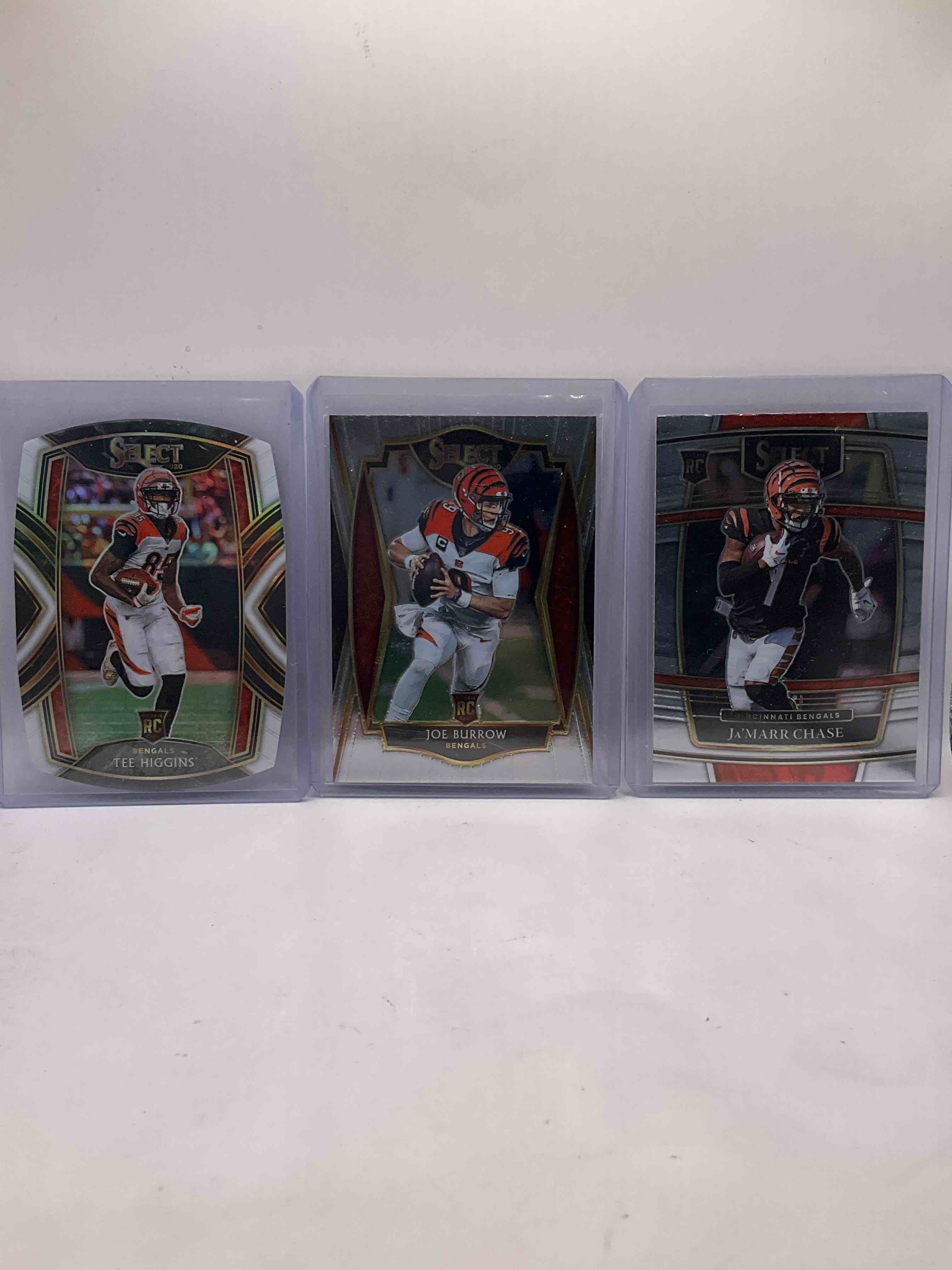 Burrow Select Rookie! Higgins Select Rookie! AND Chase Select Rookie! All In One! Combined With Super High End Burrow, Chase & Iosivas Selects! Rookies Galore!