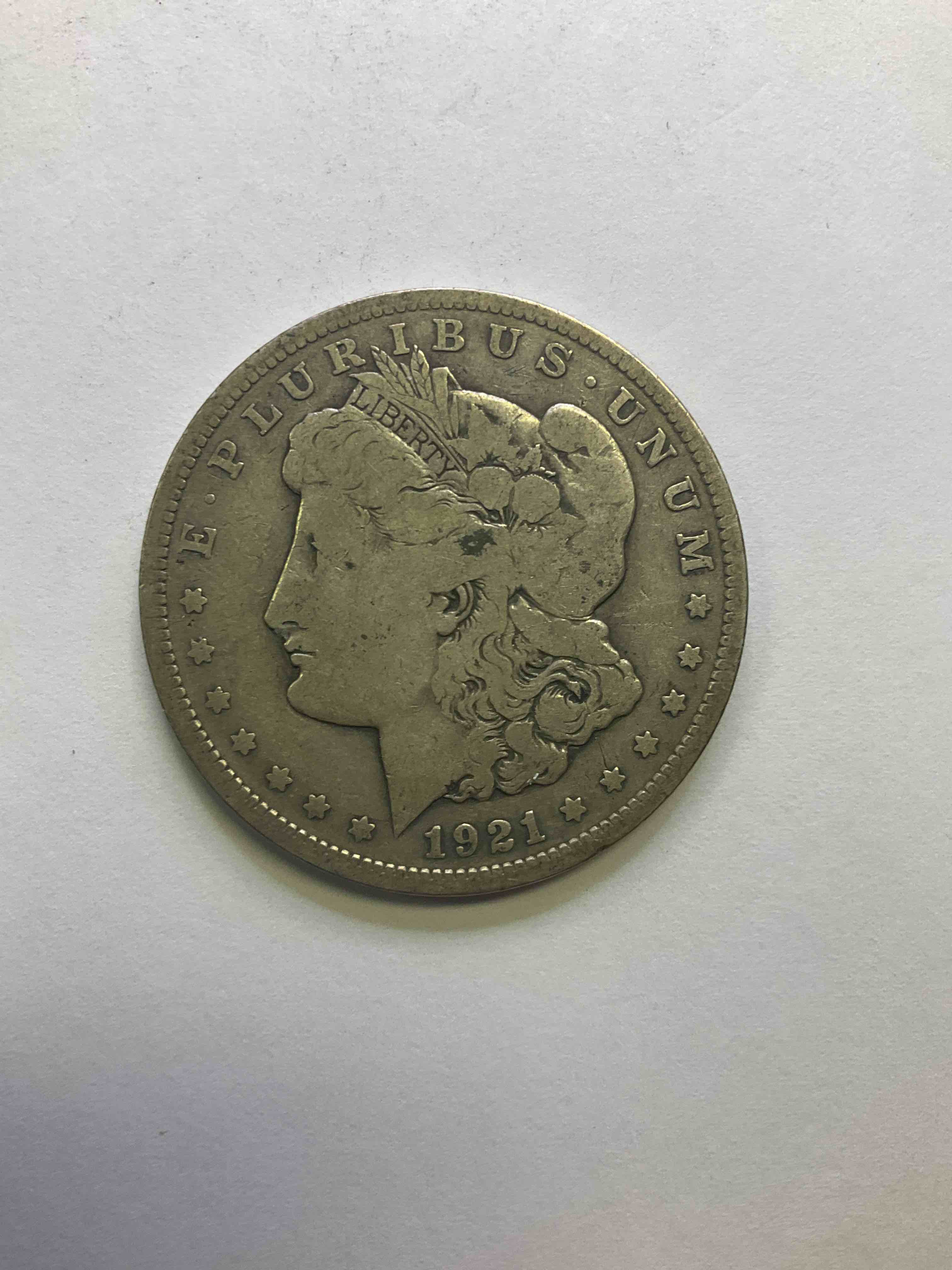 1921 Silver Morgan Dollar U.S. Coin In Very Nice Condition! Last Year Mint! Morgan Dollars Were Minted From 1878-1921 & Have Become One Of The Most Collectible Coins In History. This Large, Circulated, 1.5" Diameter, Heavy, Gorgeous Coin Is 90% Silver & 10% Copper, Giving It A Net Weight of .77344 oz. Of Pure Silver! Own A Valuable Piece Of History & An Incredible Investment In Precious Metals!