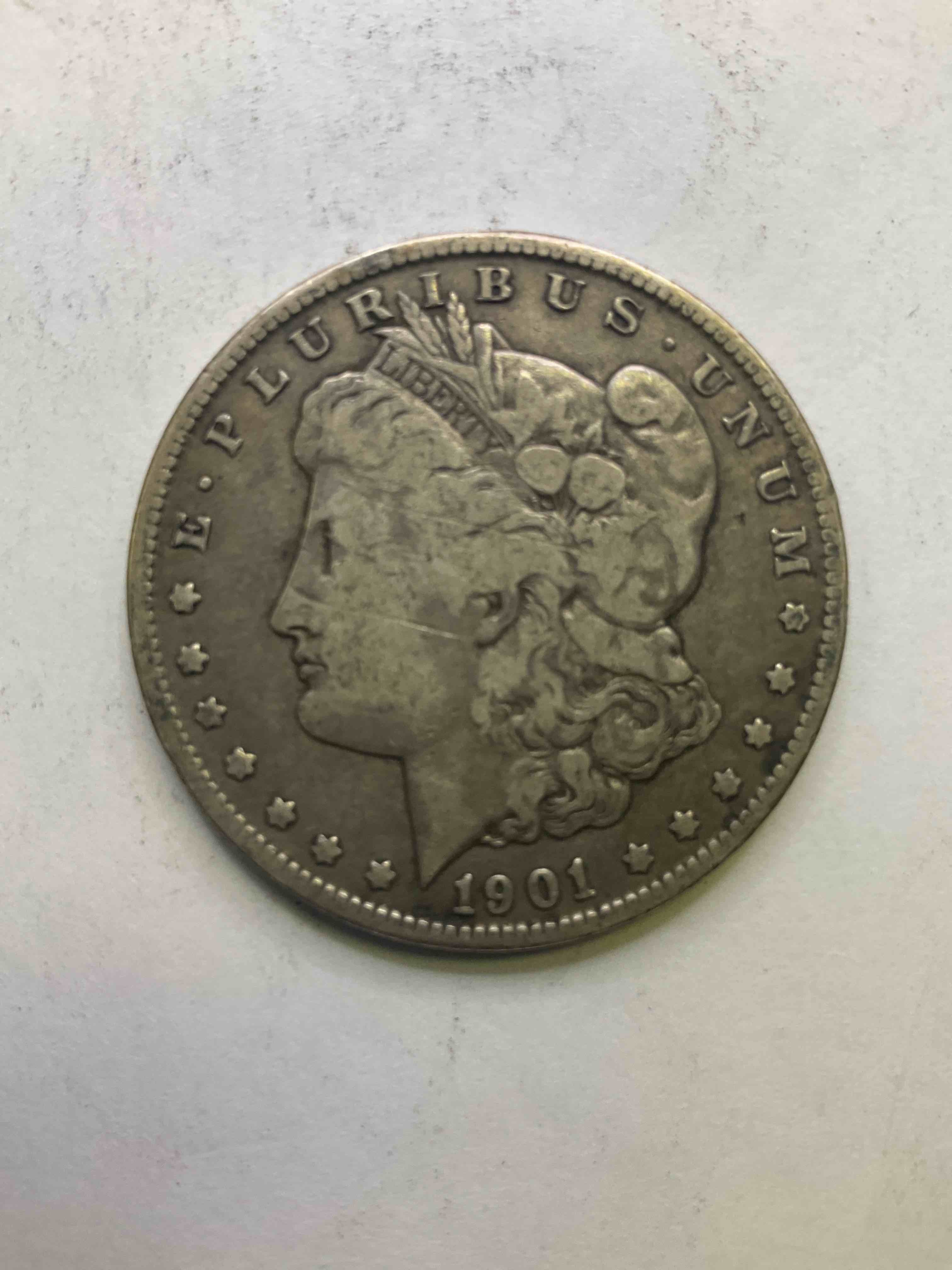 1901 Silver Morgan Dollar U.S. Coin In Very Nice Condition! Morgan Dollars Were Minted From 1878-1921 & Have Become One Of The Most Collectible Coins In History. This Large, Circulated, 1.5" Diameter, Heavy, Gorgeous Coin Is 90% Silver & 10% Copper, Giving It A Net Weight of .77344 oz. Of Pure Silver! Own A Valuable Piece Of History & An Incredible Investment In Precious Metals!