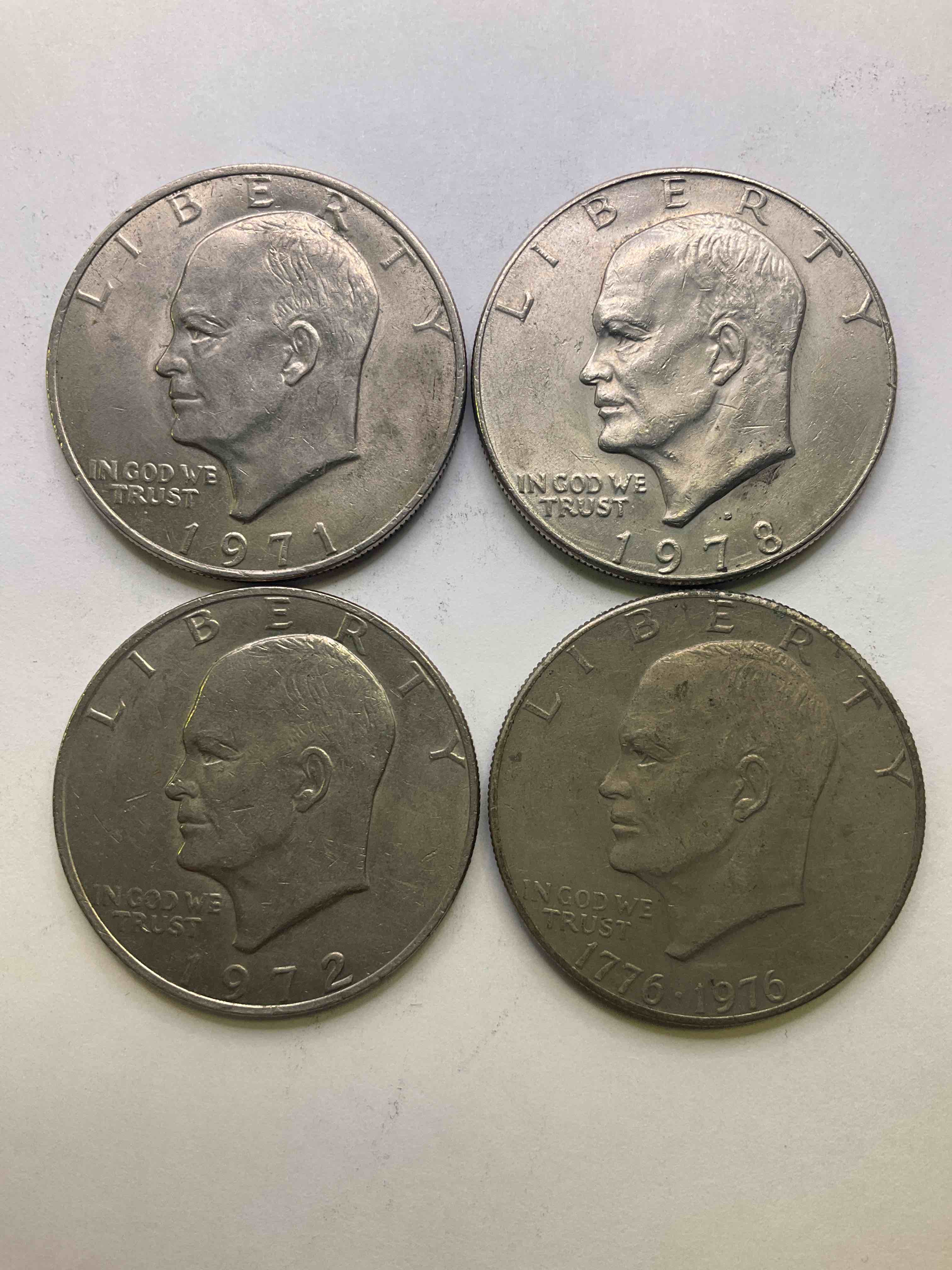 Eisenhower Dollar Coins! These Striking, Large U.S. Coins Were Minted From 1971-1978. Here Are Gorgeous Of Examples Of "Ike" Dollars In Varying Years, Including 1976 Bicentennial. These Coins Have Become Immensely Popular With Collectors & Some Have Great Toning!