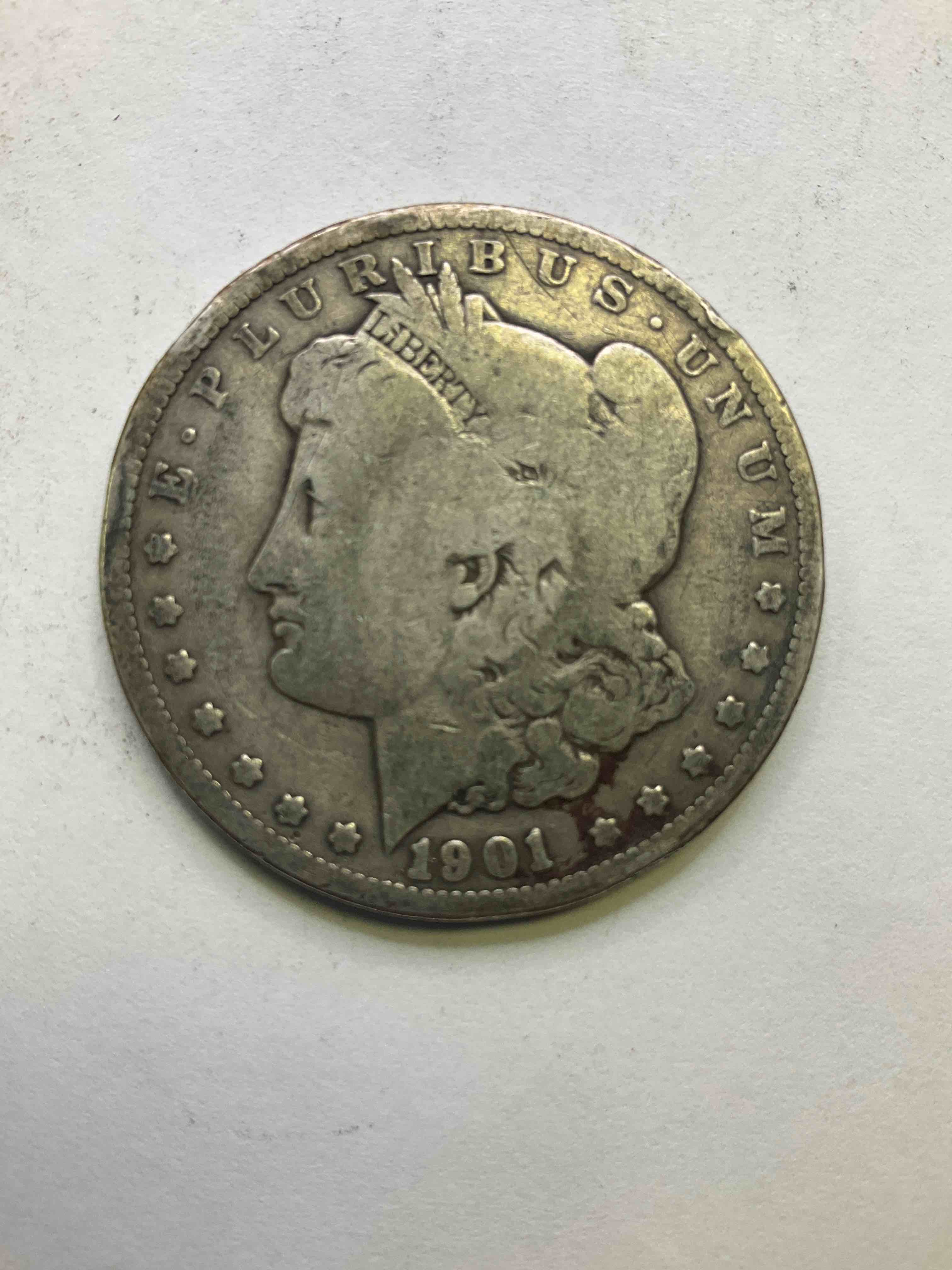 1901 Silver Morgan Dollar U.S. Coin In Very Nice Condition! Morgan Dollars Were Minted From 1878-1921 & Have Become One Of The Most Collectible Coins In History. This Large, Circulated, 1.5" Diameter, Heavy, Gorgeous Coin Is 90% Silver & 10% Copper, Giving It A Net Weight of .77344 oz. Of Pure Silver! Own A Valuable Piece Of History & An Incredible Investment In Precious Metals!