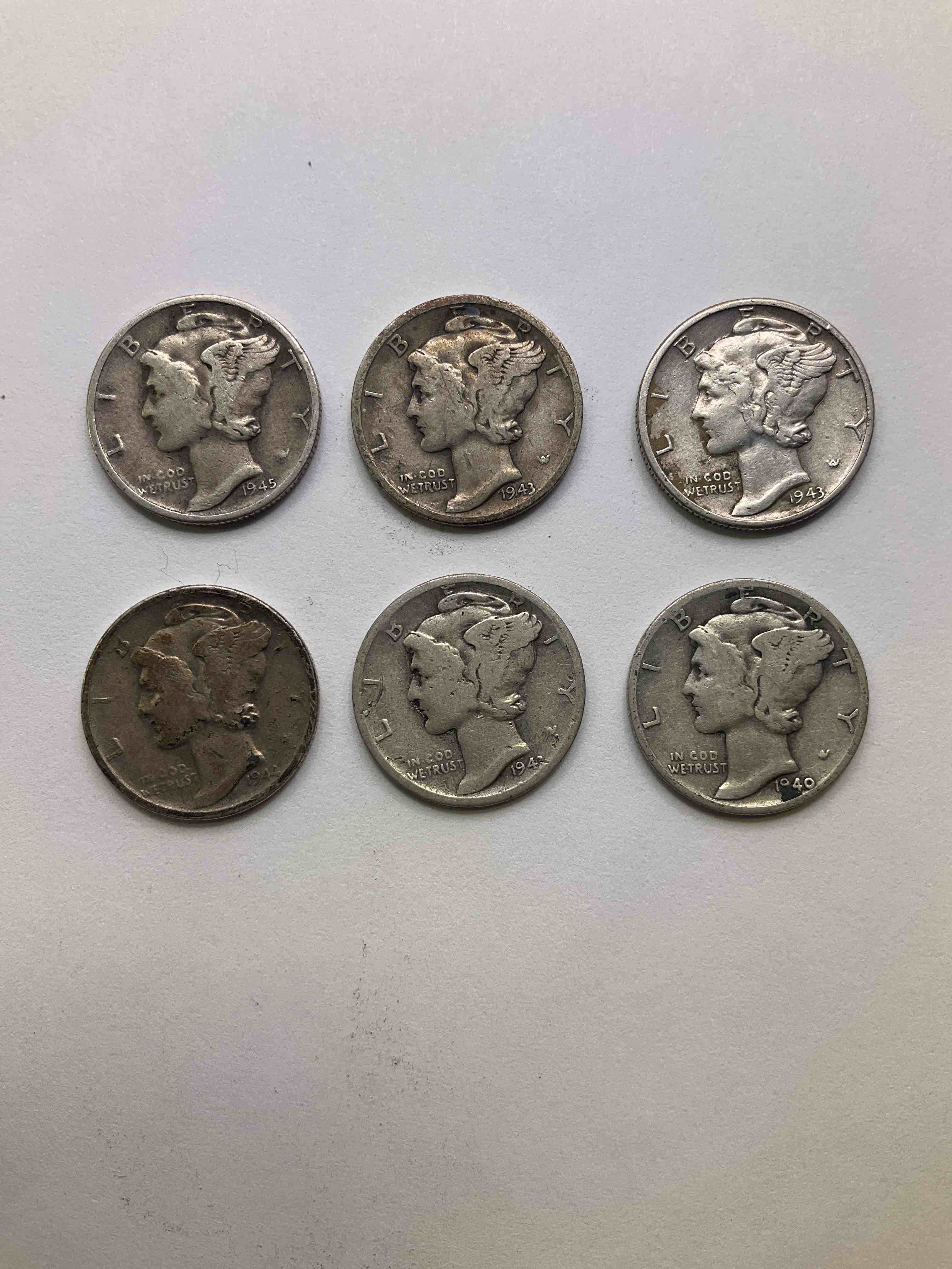 Antique U.S. Silver Mercury Dimes! Silver Mercury Dimes Were Minted From 1916-1945 & Have Become Serious Collector Items! Check Out These Awesome Examples, All In Nice, Circulated Condition With Visible Dates & Varying Years! Rare To Have Visible Dates! Makes For A Great Investment In Precious Metals, Mercury Dimes Are 90% Pure Fine Silver! They Don't Make Em' Like This Anymore! Look For WWII Era Dates!