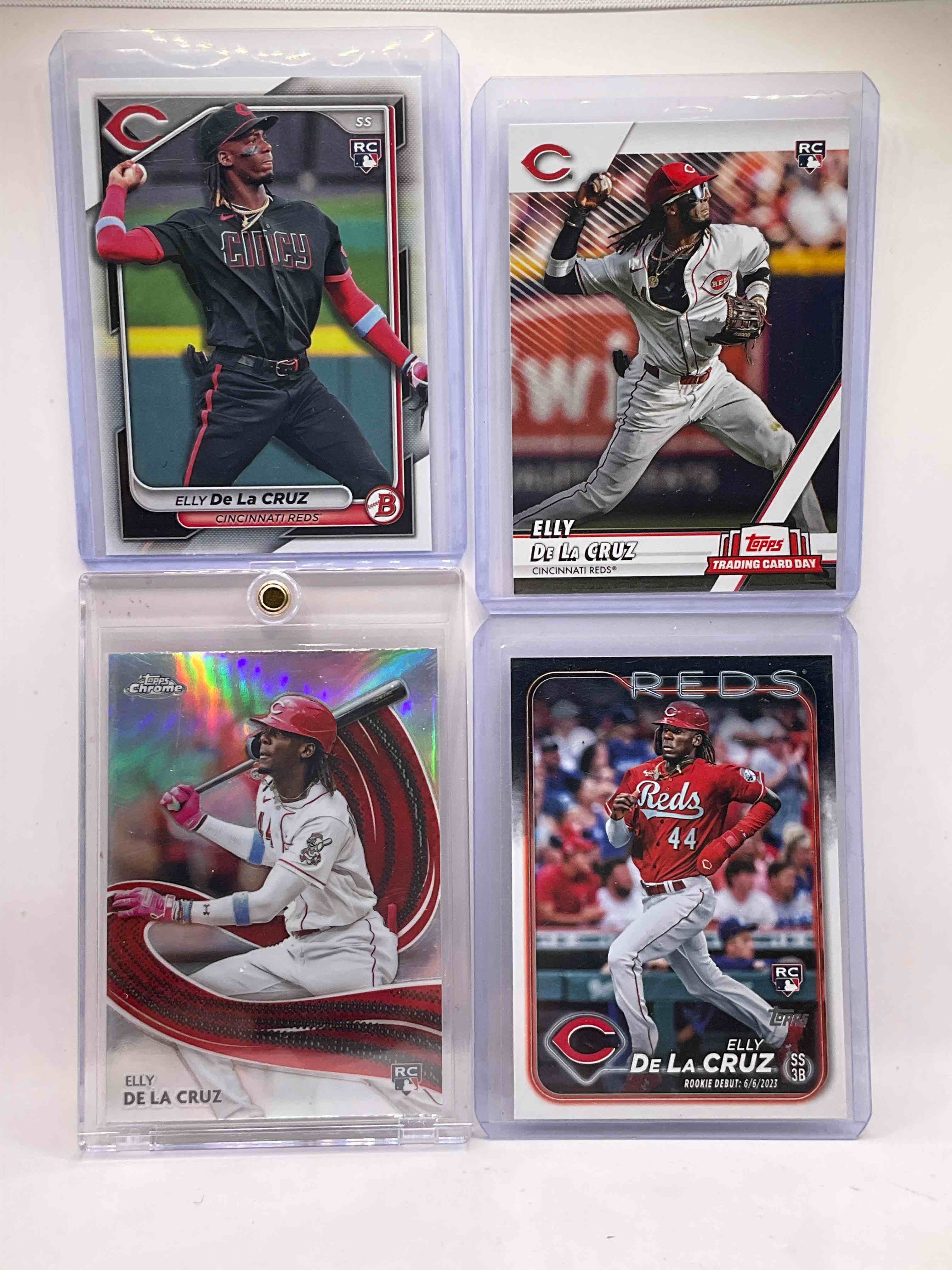 Elly De La Cruz Quadruple Rookie Craziness! Start Off The Season Right By Collecting One oF The Best MLB Players! Elly De La Cruz Topps Chrome Strokes, Bowman Base, Trading Card Day Rookies! Wow! All In Hard Cases!