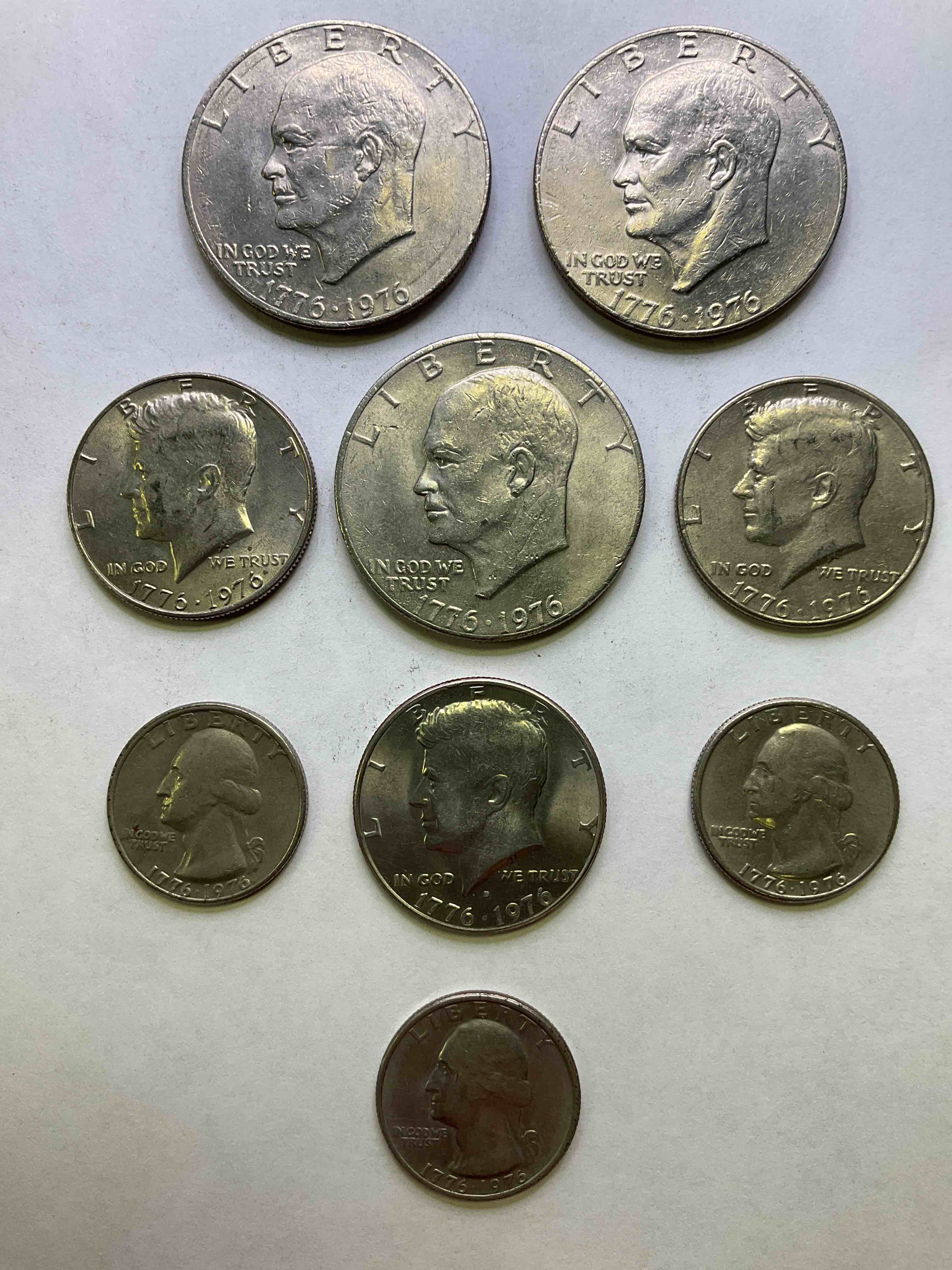 1976 Bicentennial Bliss! In 1976 The U.S. Mint Produced Coins Celebrating The 200 Year Anniversary Of America. Up For Auction Are Awesome Examples Oí All Three Coins Produced For This... The Quarter, Half Dollar & Infamous "Ike" Dollar Coin! Highly Desirable For Collectors! Own Pieces Of History & Get Ready For America's 250 Year Anniversary Coming Soon!