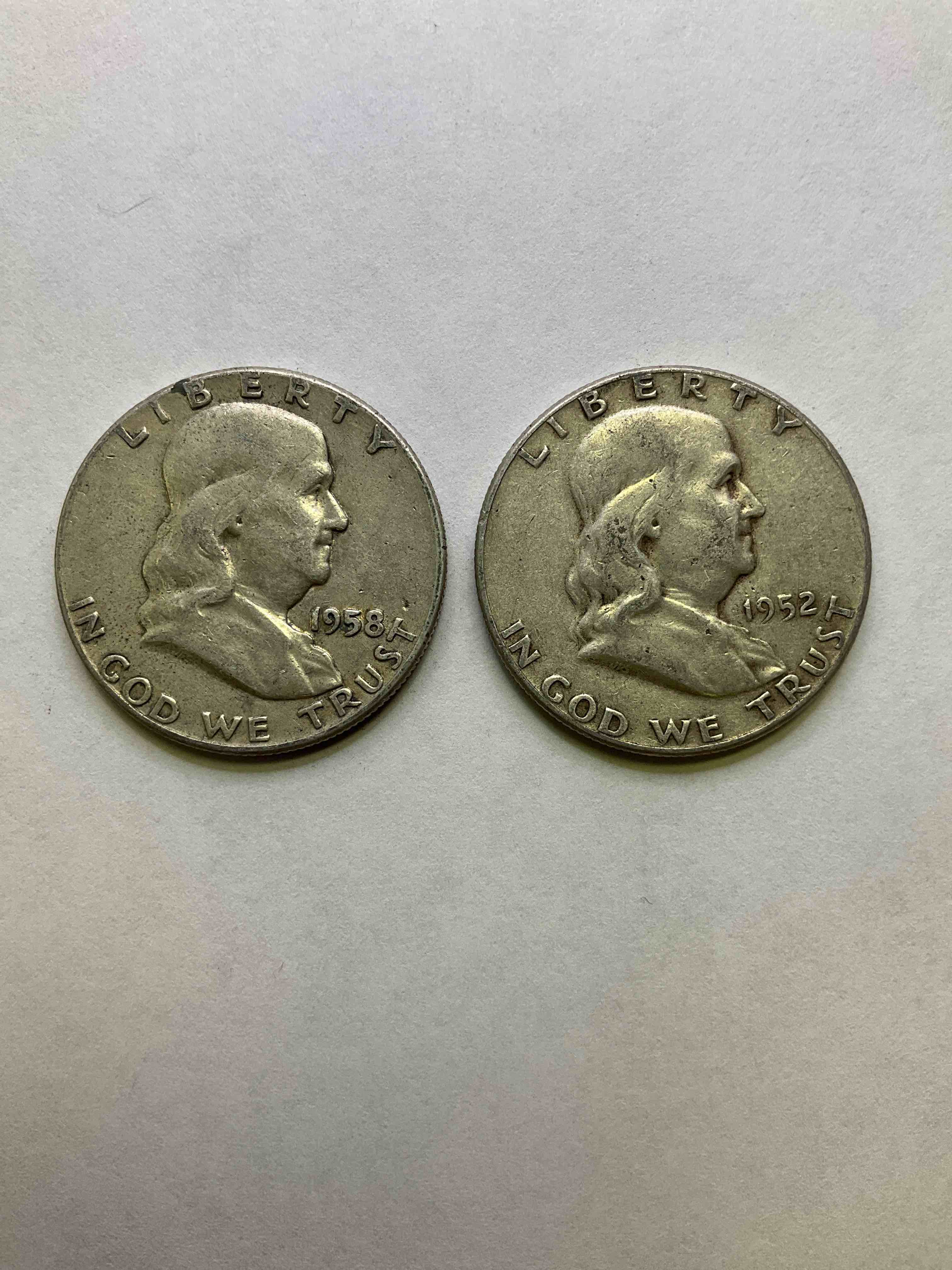 Ben Franklin Silver! 1950's Silver U.S. Half Dollar Coins! Before 1965 American Half Dollars Were Actually Silver, Here Are Two Gorgeous Examples Of Rare Ben Franklin Silver Half Dollars, In Rare Years Of 1952 & 1958, In Great Circulated Condition. Great For Investing In Precious Metals! These Heavy Half Dollars Were Minted At 90% Silver and 10% Copper, Giving Them A Net Weight Of .36169 Ounces Of Pure Silver Per Coin! Very Rare In This Condition!