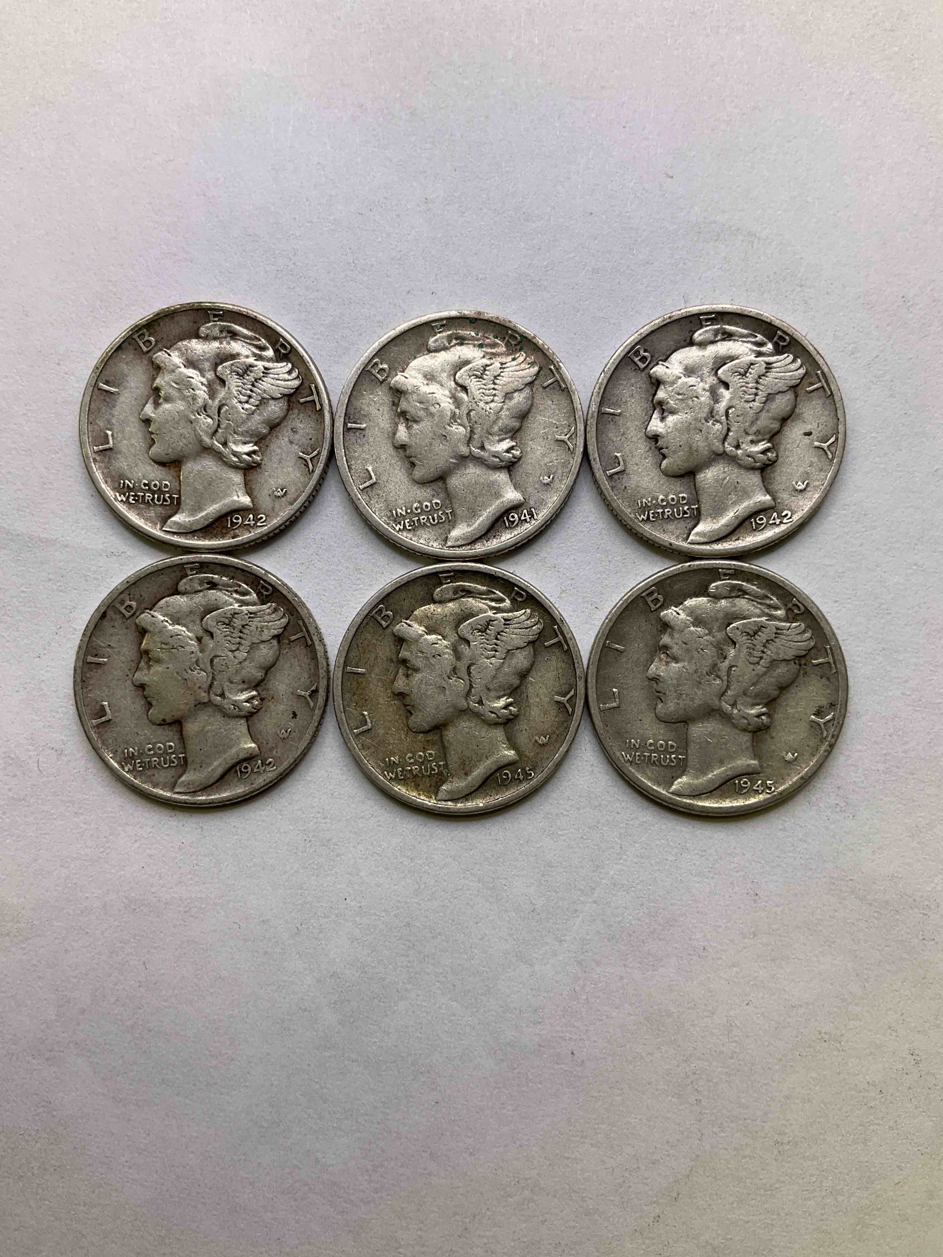 Antique U.S. Pure Fine Silver Mercury Dimes! Silver Mercury Dimes Were Minted From 1916-1945 & Have Become Serious Collector Items! Check Out These Awesome Examples, All In Nice, Circulated Condition With Visible Dates & Varying Years! Rare To Have Visible Dates! Makes For A Great Investment In Precious Metals, Mercury Dimes Are 90% Pure Fine Silver! They Dont Make Em' Like This Anymore!