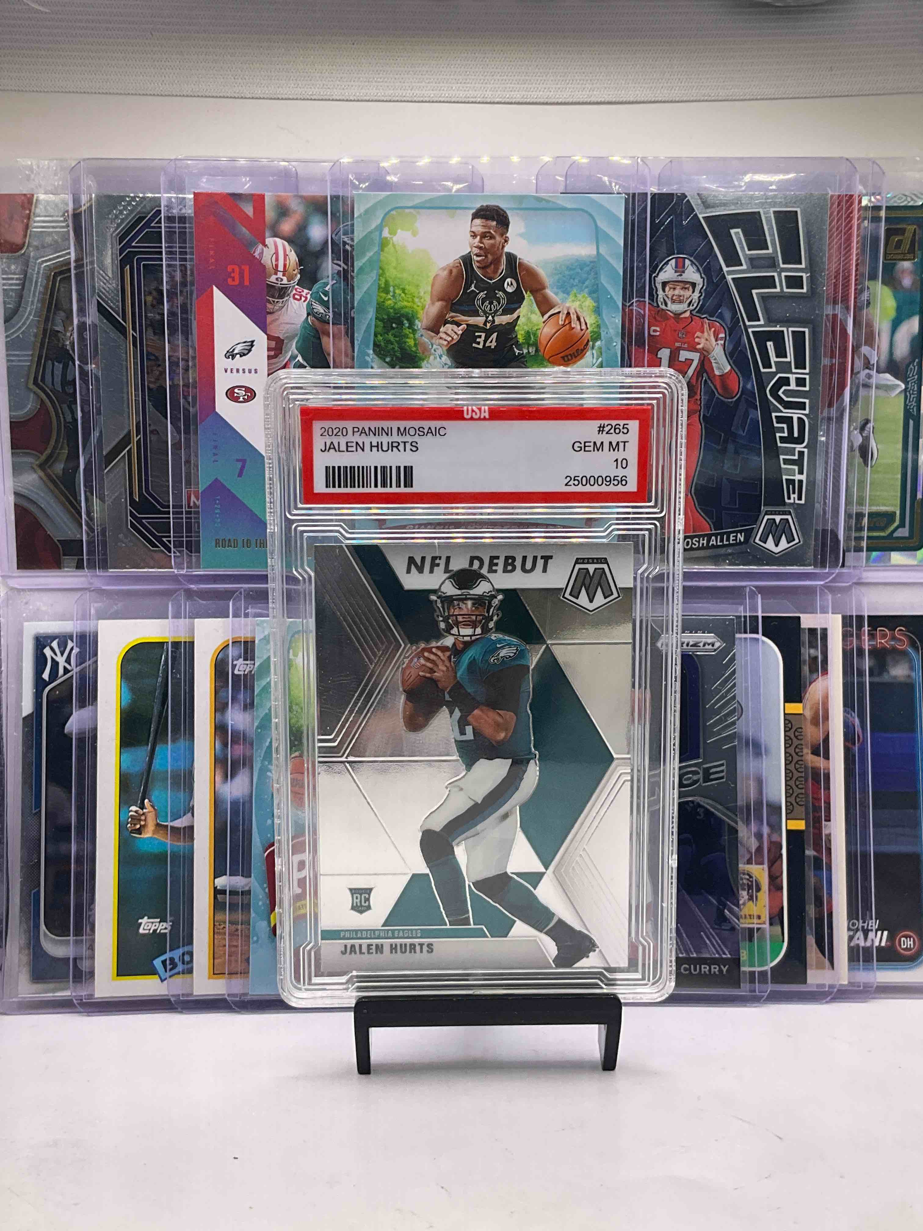 GOATs, MVPs, Super Bowl Winners & More! The GOAT Tom Brady Card, The GOAT Michael Jordan Card, Greatest Shooter Of All Time Steph Curry Card, Gem Mint 10 Super Bowl Winner JALEN HURTS Rookie Card, Giannis, Josh Allen, Bo Jackson & Shohei Ohtani Cards! Awesome Card Lot!