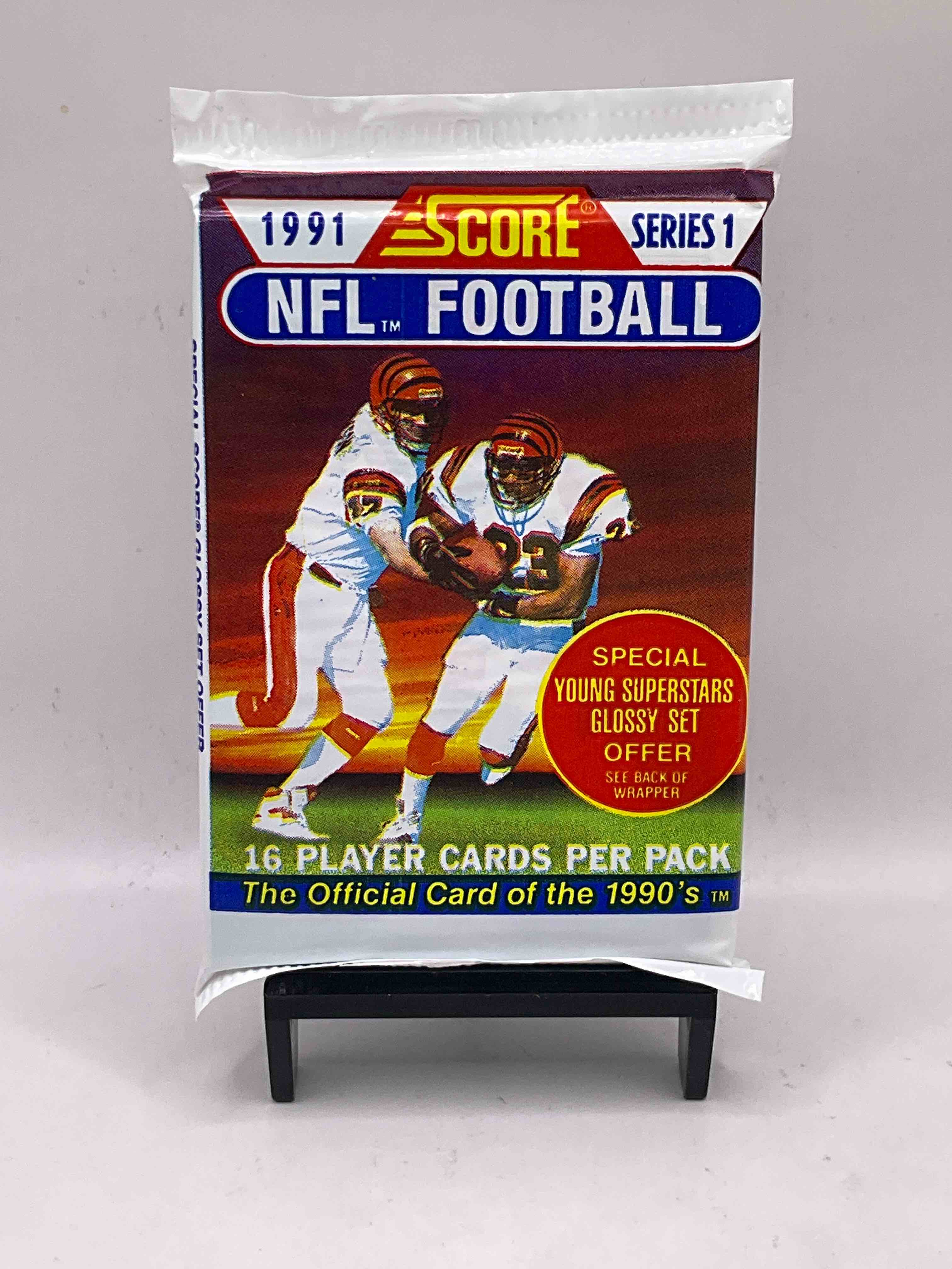 1991 NFL Score Football Sealed Card Pack, Direct From Original Retail Case! These Cards Are Sought After By Collectors For Their Awesome, Nostalgic Look. Search For Brett Favre Rookie, Early Jerry Rice, Early Emmit Smith, Joe Montana & So Much More!