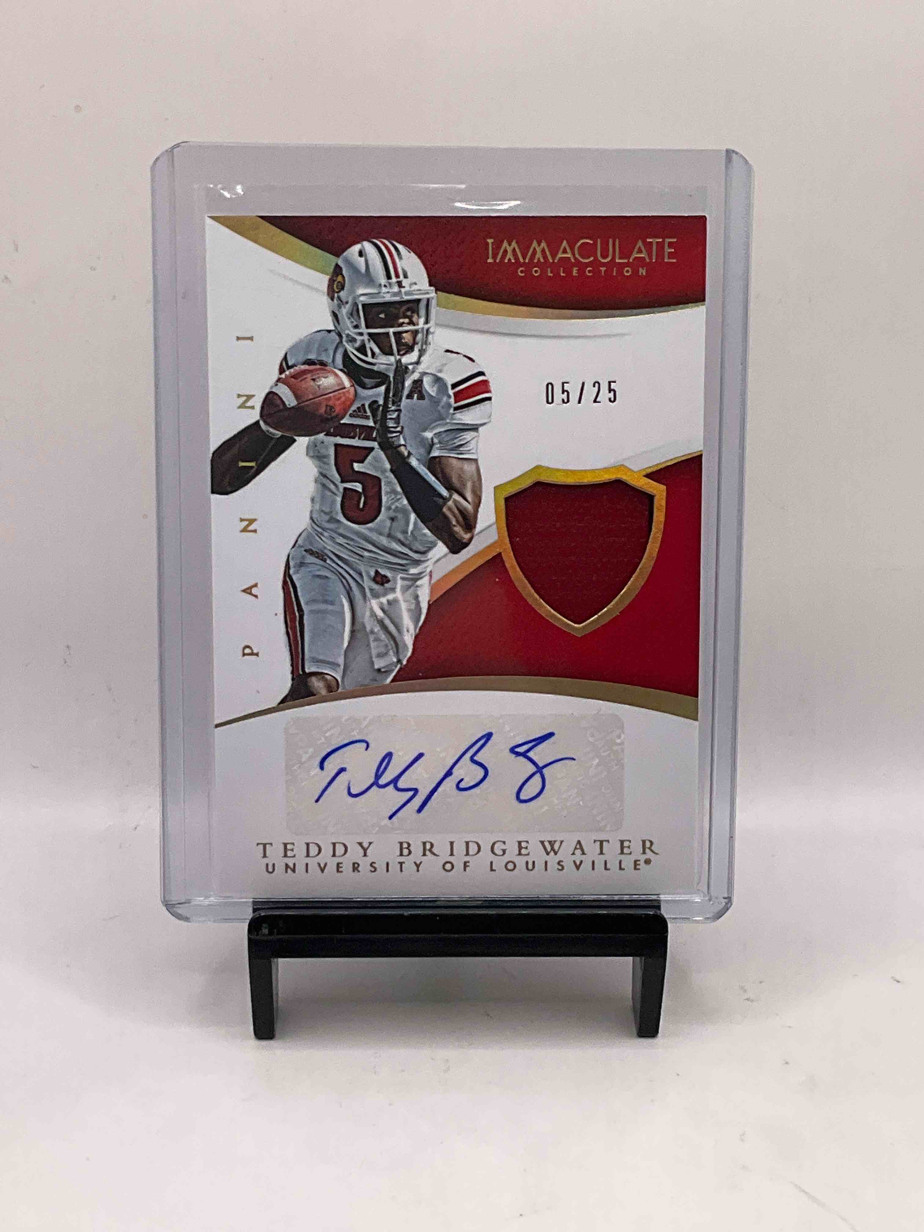 Louisville Legends! Immaculate Collection Player-Worn Teddy Bridgewater Signed Jersey Card 05/25, The Card Number Matches His Jersey Number Making This Card Extra Rare! Louisville Legend Michael Bush Authentic Jersey Card Cut Straight From Game Worn Jersey /250 Rare Card, Teddy Bridgewater Bowman Jersey Rookie Card With Player Worn Memorabilia & Awesome Patch! Kolby Smith Game Used Jersey Card Press Proof, Michael Bush Game Used Jersey Card & More Louisville Legends! Insane 9 Card Louisville Cardinals Lot! Get Your Hands On These Rare Local & National Sensations!