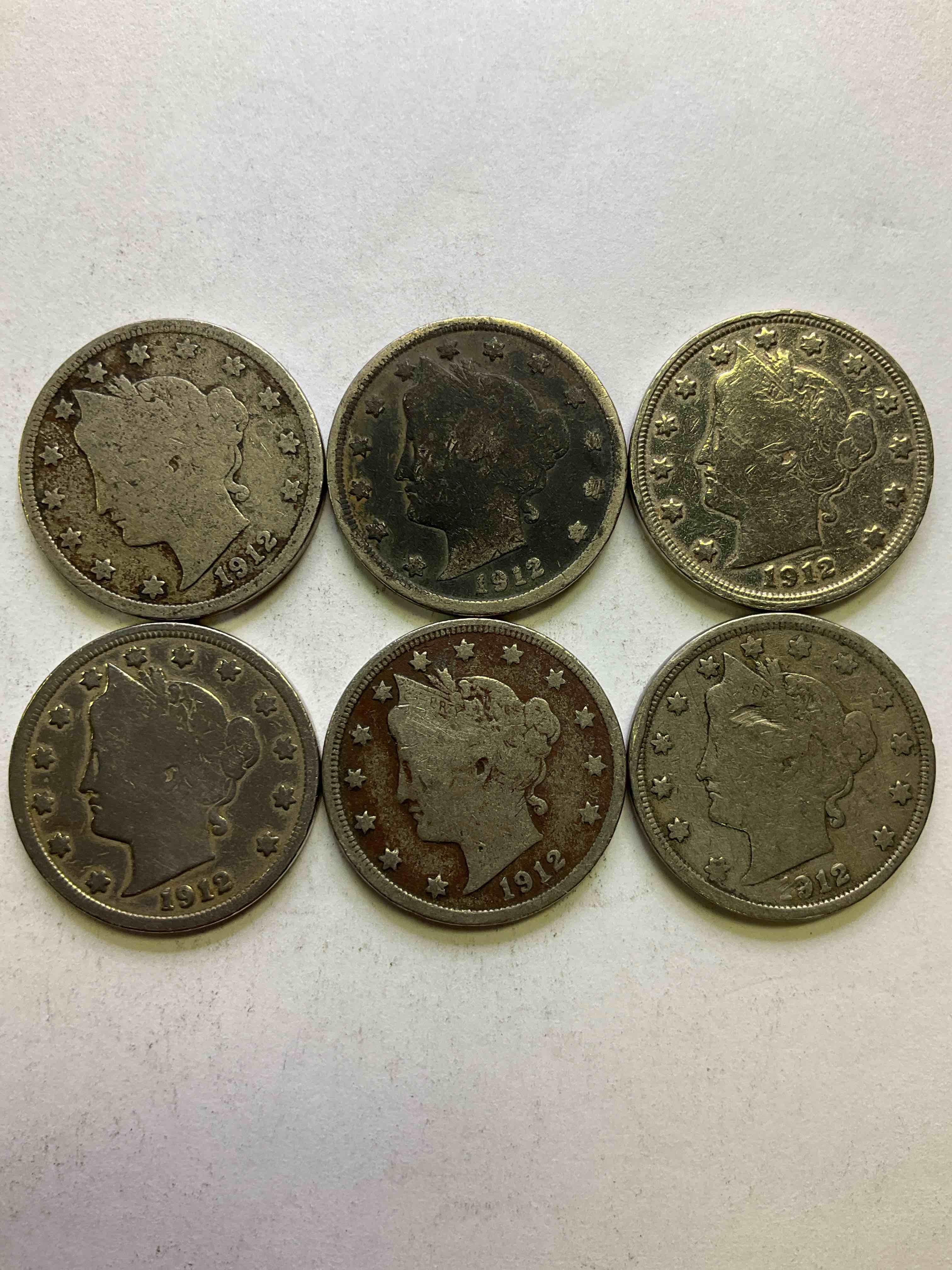 1912 Year Of The Titanic! Nearly Impossible To Collect! 1912 Antique U.S. Liberty Head "V Nickels," From The Year Of The Sinking Of The Titanic! Own A Piece Of History Great For Coin Collectors, Think Of The History These Coins Have Seen! Liberty Head V Nickels Were Minted Up Until 1913 & Were The Style Of Nickels Before Buffalo Nickels. Own Some Cool Pieces Of History! Rare To See These Coins With The "Date On" In Circulated Condition!