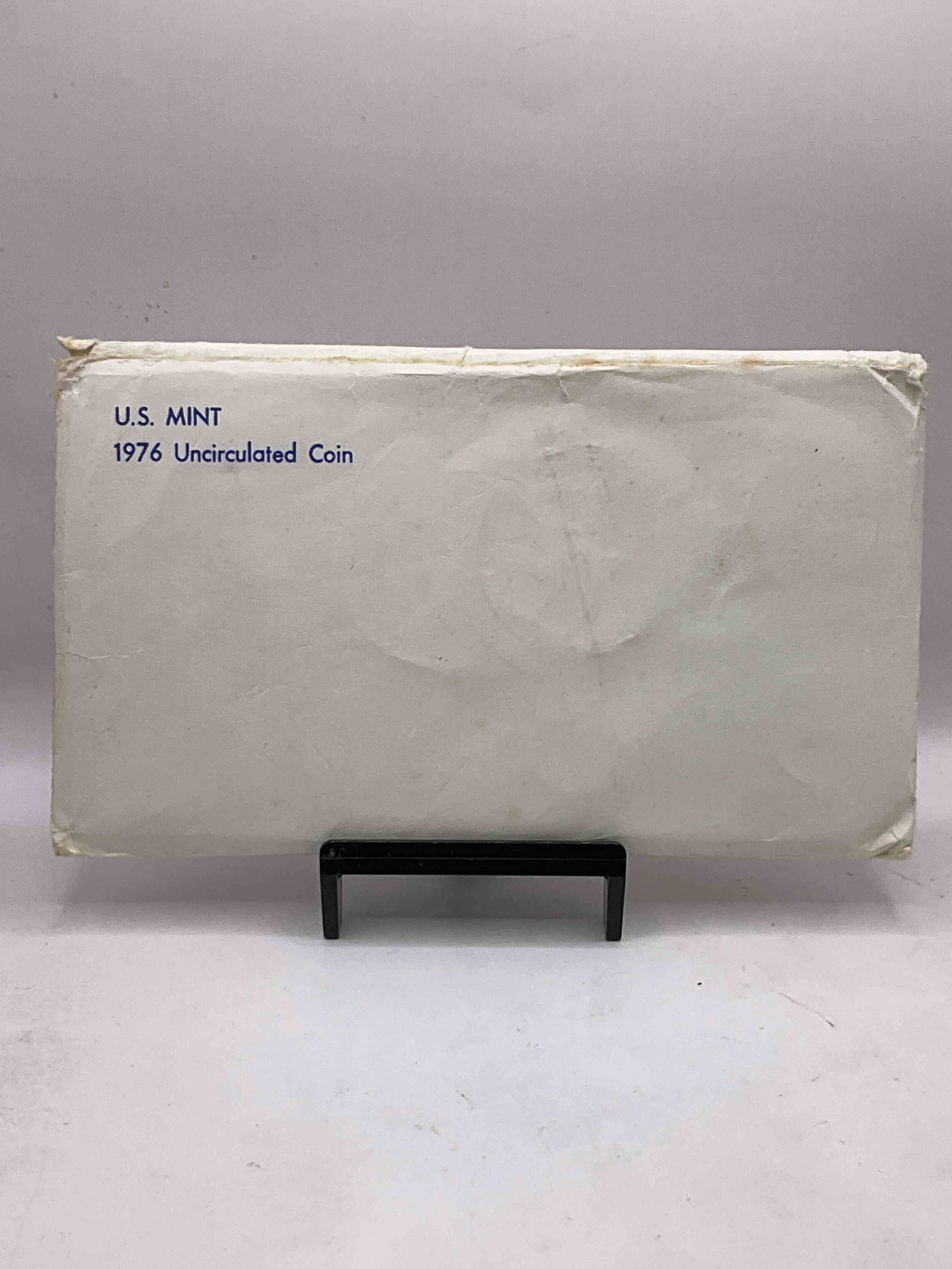1976 Bicentennial Mint Set! This Highly Collectible Mint Set Includes 10 Coins, Five Minted From Each Mint Location (Philly & Denver) That Year. Coins Are 1976 Special Bicentennial Edition, To Include Rare Bicentennial "Ike" Dollar! Still In Its Original Envelope Direct From The U.S. Treasury in 1976!