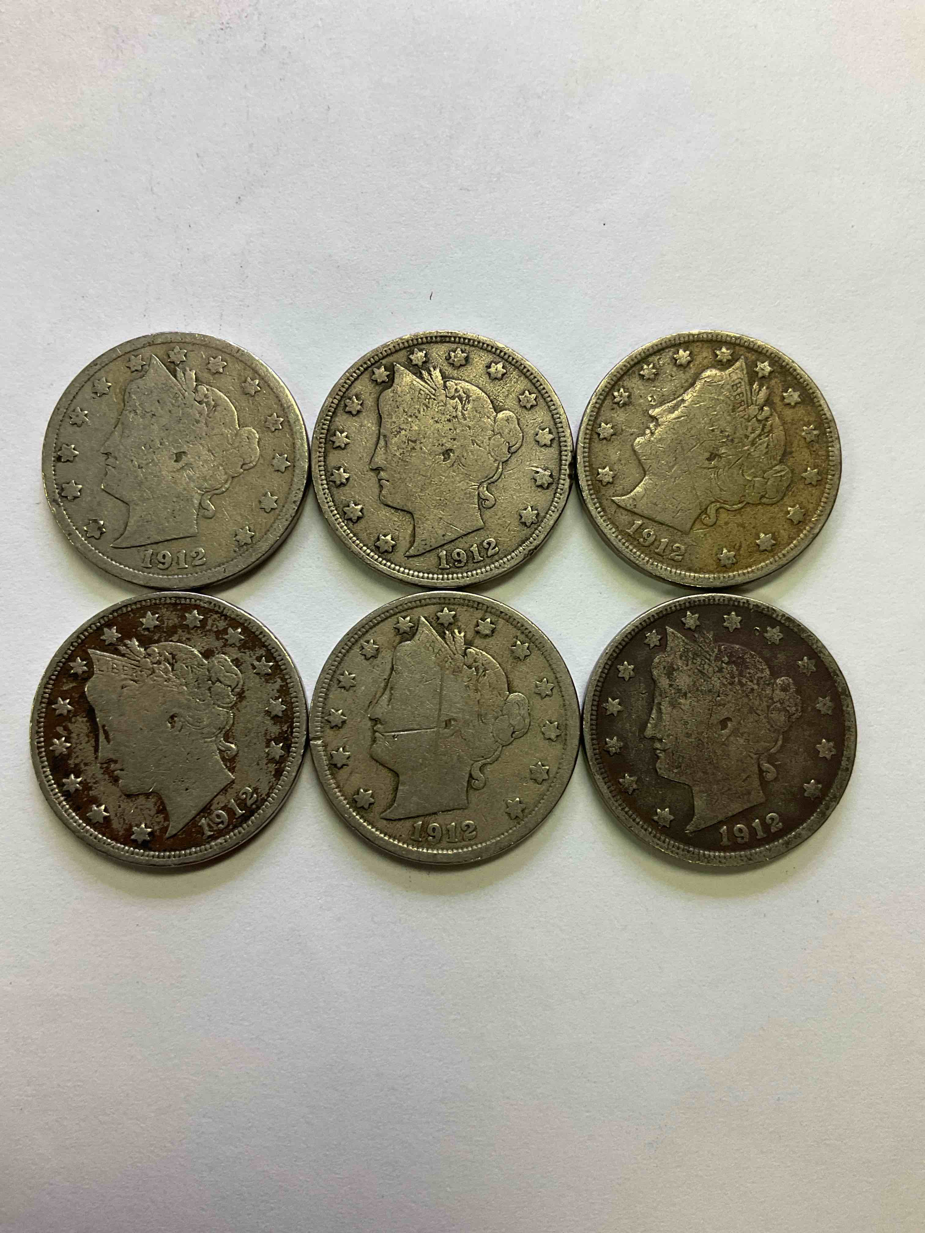 1912 Year Of The Titanic! Nearly Impossible To Collect! 1912 Antique U.S. Liberty Head "V Nickels," From The Year Of The Sinking Of The Titanic! Own A Piece Of History Great For Coin Collectors, Think Of The History These Coins Have Seen! Liberty Head V Nickels Were Minted Up Until 1913 & Were The Style Of Nickels Before Buffalo Nickels. Own Some Cool Pieces Of History! Rare To See These Coins With The "Date On" In Circulated Condition!