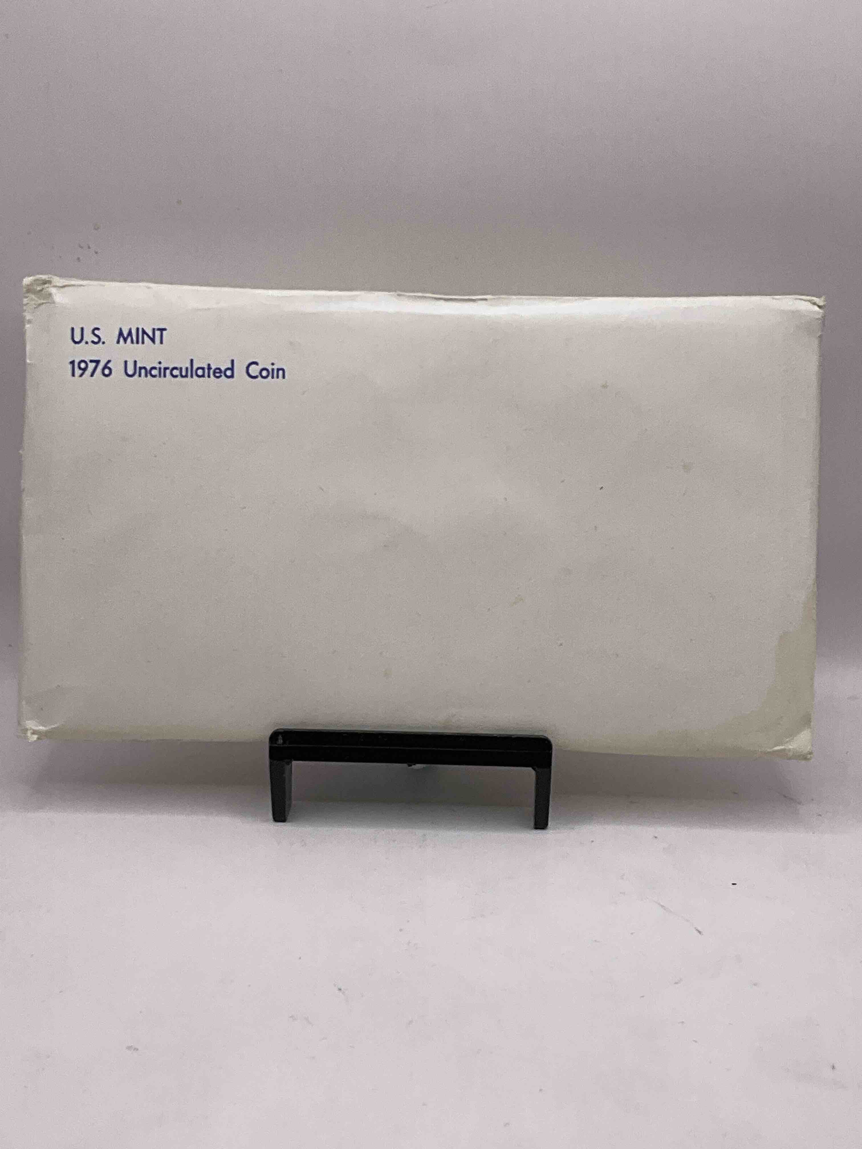 1976 Bicentennial Mint Set! This Highly Collectible Mint Set Includes 10 Coins, Five Minted From Each Mint Location (Philly & Denver) That Year. Coins Are 1976 Special Bicentennial Edition, To Include Rare Bicentennial "Ike" Dollar! Still In Its Original Envelope Direct From The U.S. Treasury in 1976!