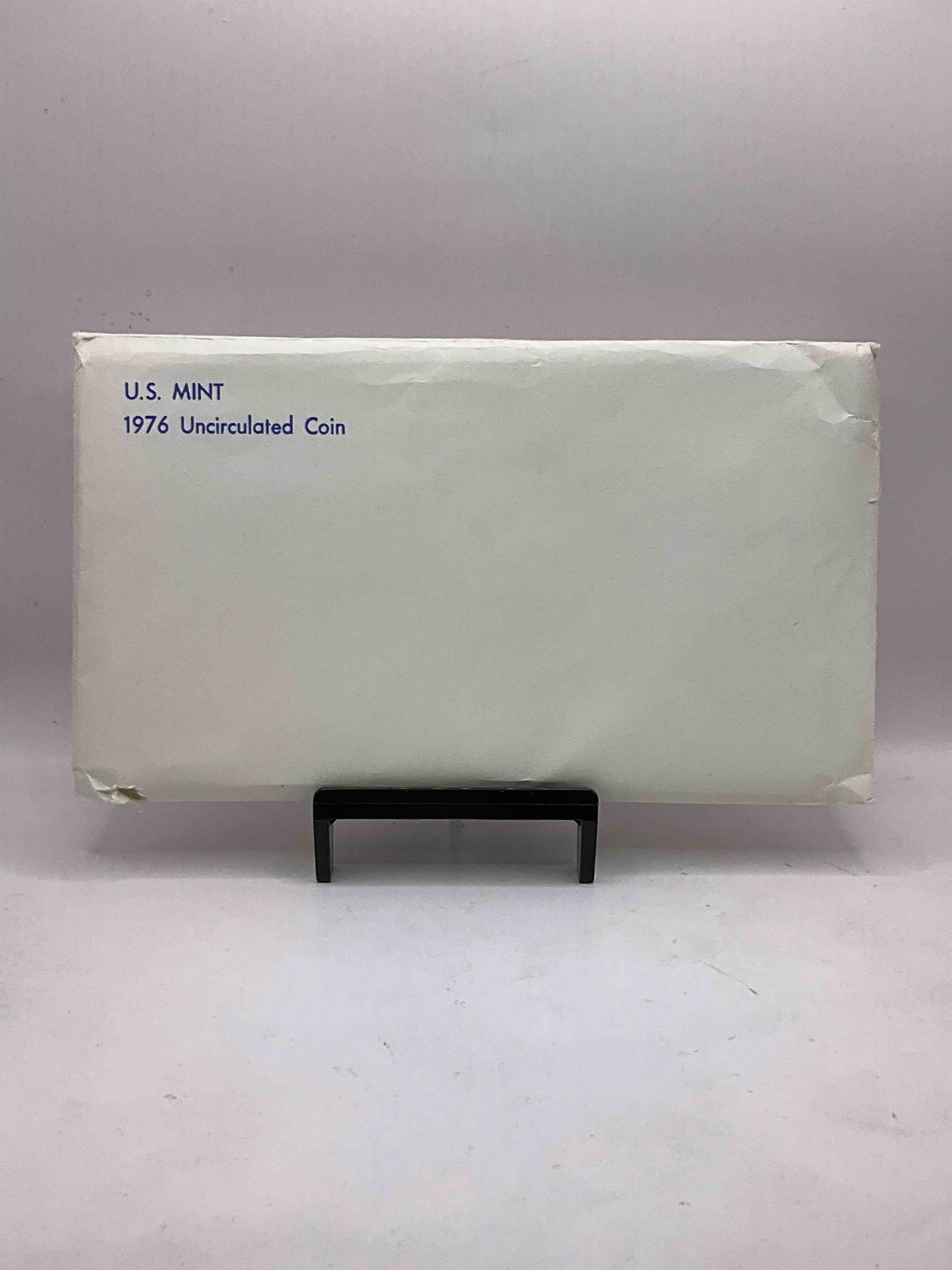 1976 Bicentennial Mint Set! This Highly Collectible Mint Set Includes 10 Coins, Five Minted From Each Mint Location (Philly & Denver) That Year. Coins Are 1976 Special Bicentennial Edition, To Include Rare Bicentennial "Ike" Dollar! Still In Its Original Envelope Direct From The U.S. Treasury in 1976!