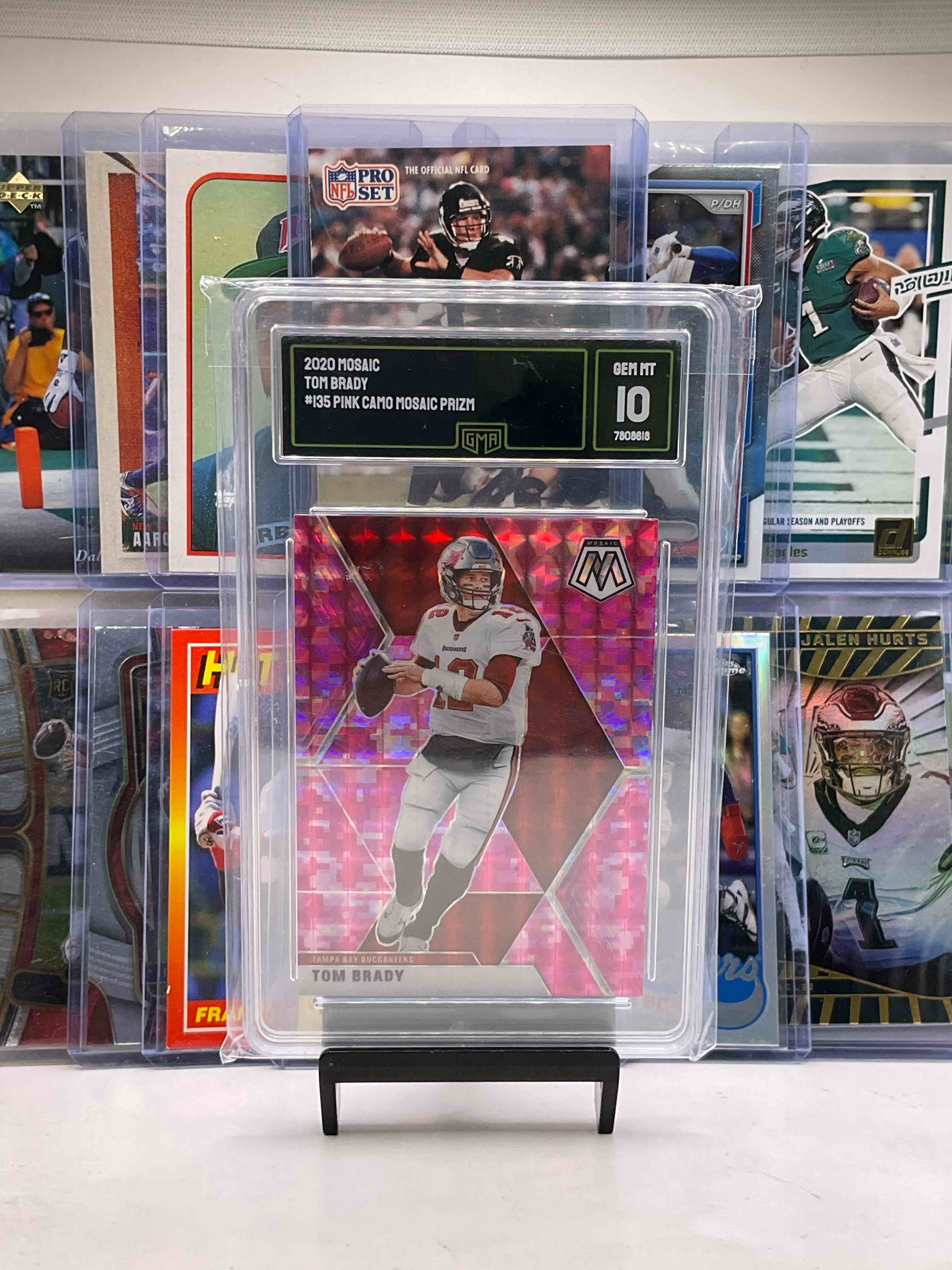 Tom Brady, The GOAT Gem Mint 10 Mosaic Card… Pink Edition! Rare! Brett Favre Rookie, Bo Jackson Rookie, 1990 Ken Griffey JR, Jalen Hurts Rookie, CJ Stroud Rookie, Emmitt Smith Cards, Shohei Ohtani & More!