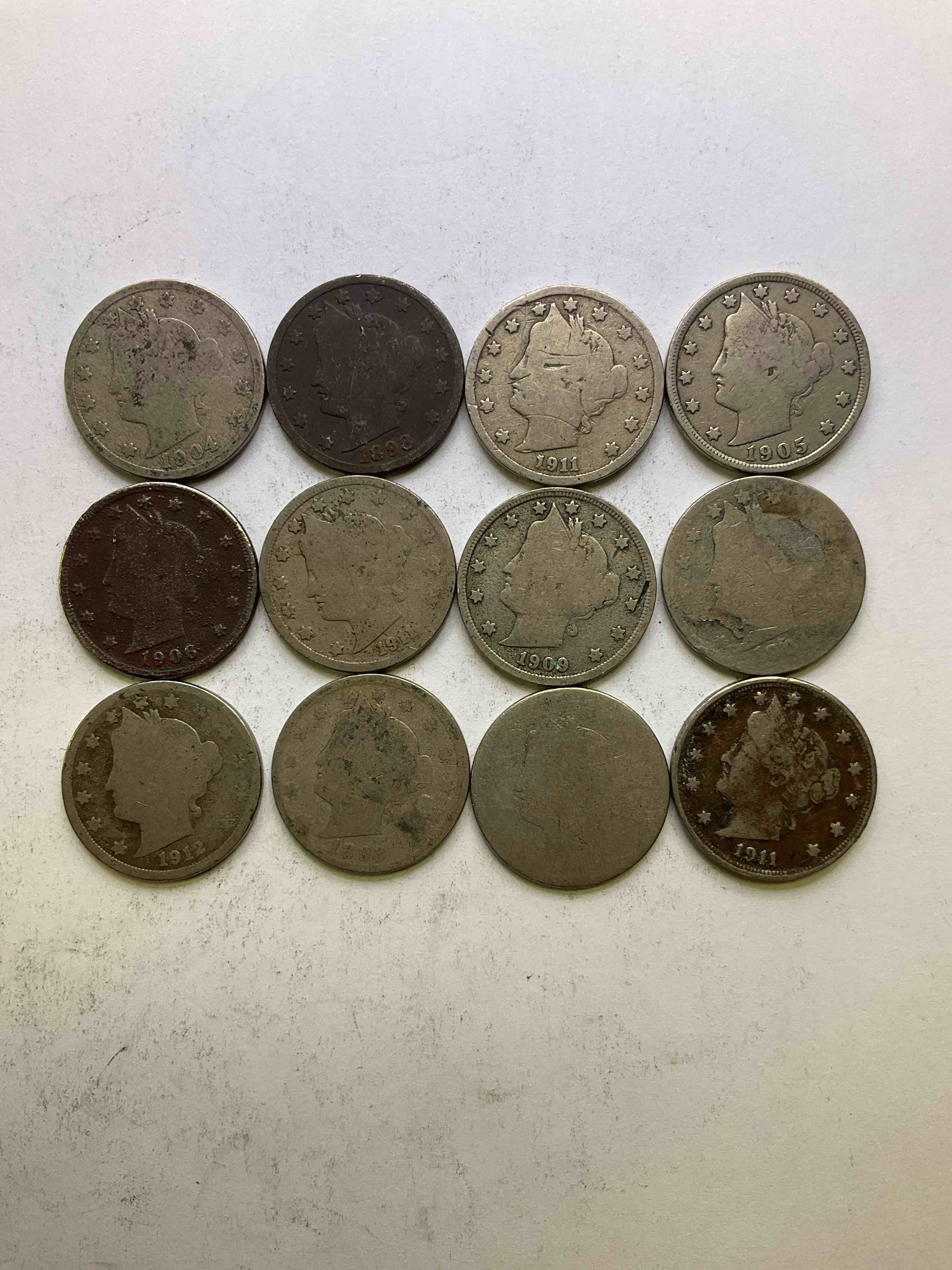 Antique U.S. "V" Nickels, 1912 Year Of The Titanic! Nearly Impossible To Collect! Antique V Nickels, Includes At Least One 1912, The Year Of The Sinking Of The Titanic! Own A Piece Of History Great For Coin Collectors, Think Of The History These Coins Have Seen! Liberty Head V Nickels Were Minted Up Until 1913 & Were The Style Of Nickels Before Buffalo Nickels. Own Some Cool Pieces Of History! Rare To See These Coins With The "Date On" In Circulated Condition!