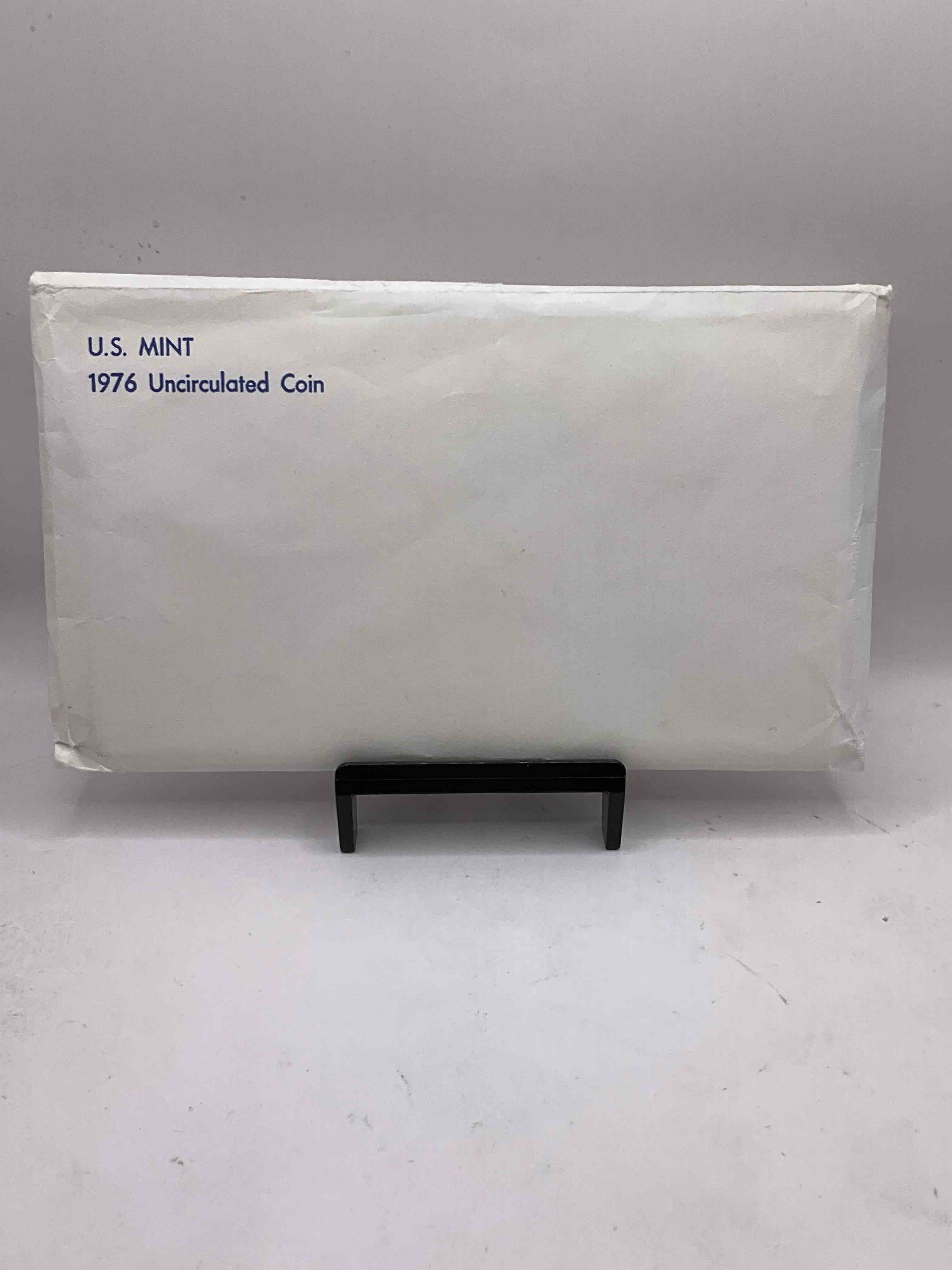 1976 Bicentennial Mint Set! This Highly Collectible Mint Set Includes 10 Coins, Five Minted From Each Mint Location (Philly & Denver) That Year. Coins Are 1976 Special Bicentennial Edition, To Include Rare Bicentennial "Ike" Dollar! Still In Its Original Envelope Direct From The U.S. Treasury in 1976!