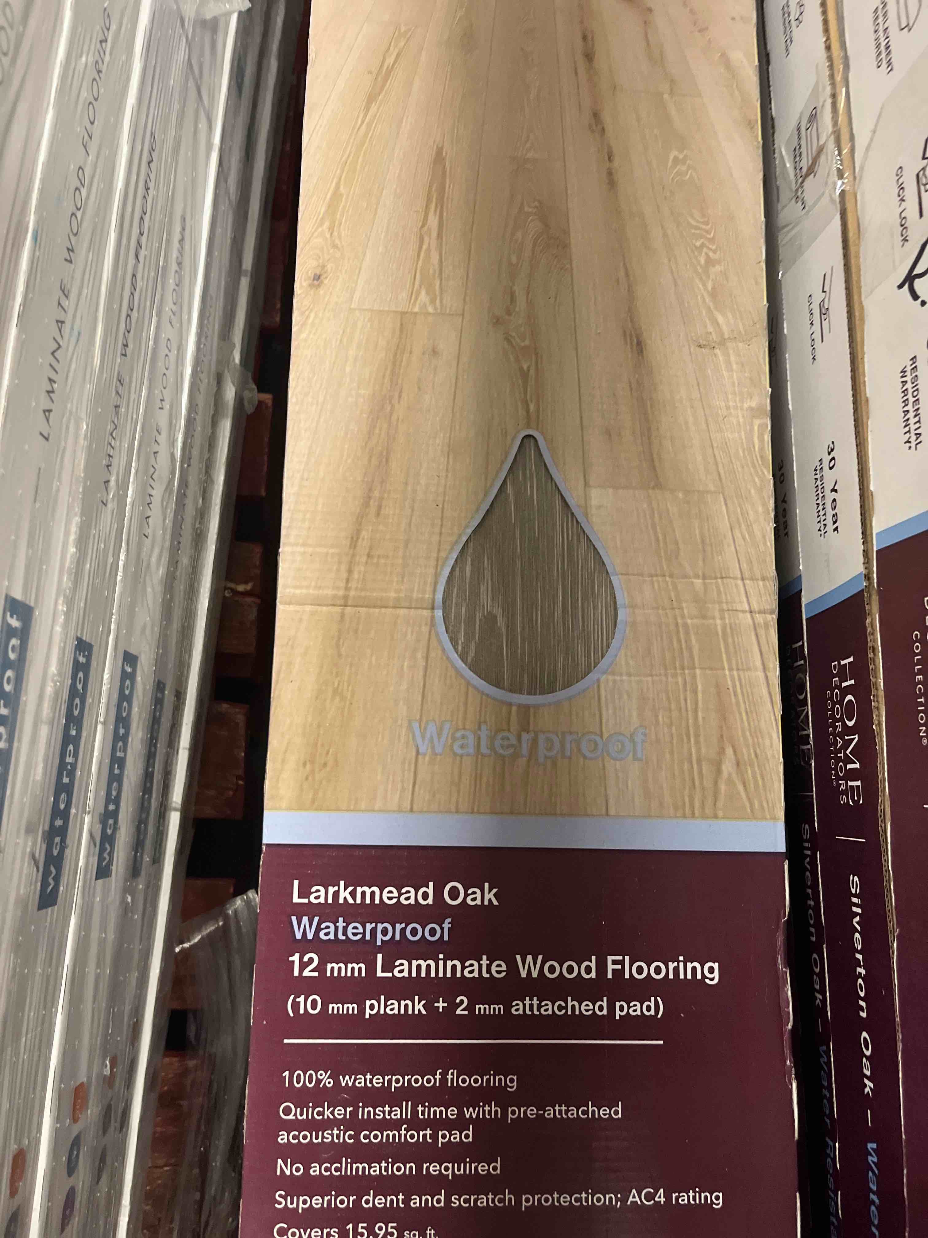 Home Decorator Larkmead Oak Waterproof Laminated Wood Flooring (15.95 sq.ft per box) 5 Boxes for pick Up 79.75sq.ft you bid per sq.ft 