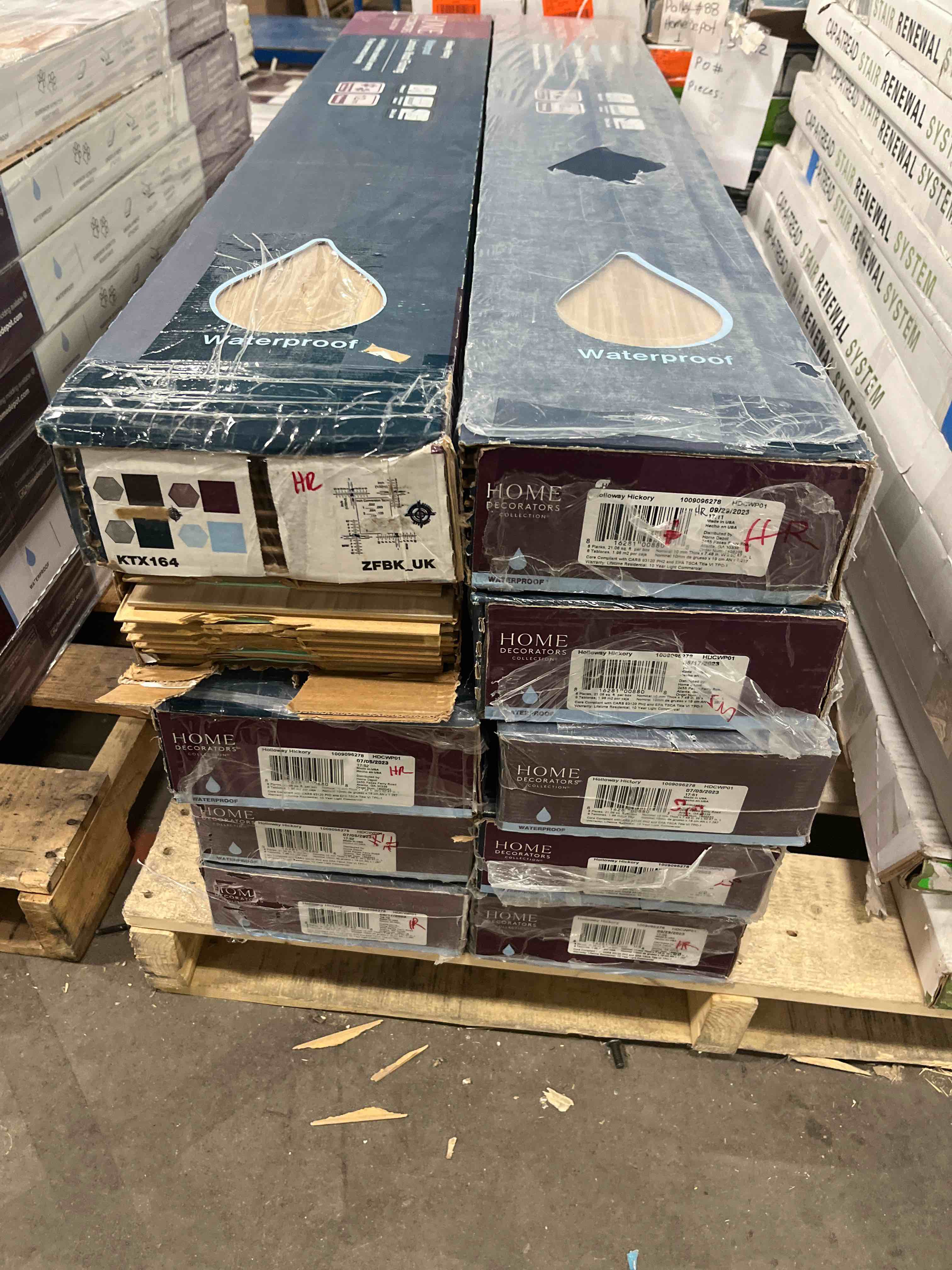 Home decorator Holloway Hickory Laminate wood flooring (21.06 sq.ft per box) 10 Boxes for pick Up 216 you bid per sq.ft 