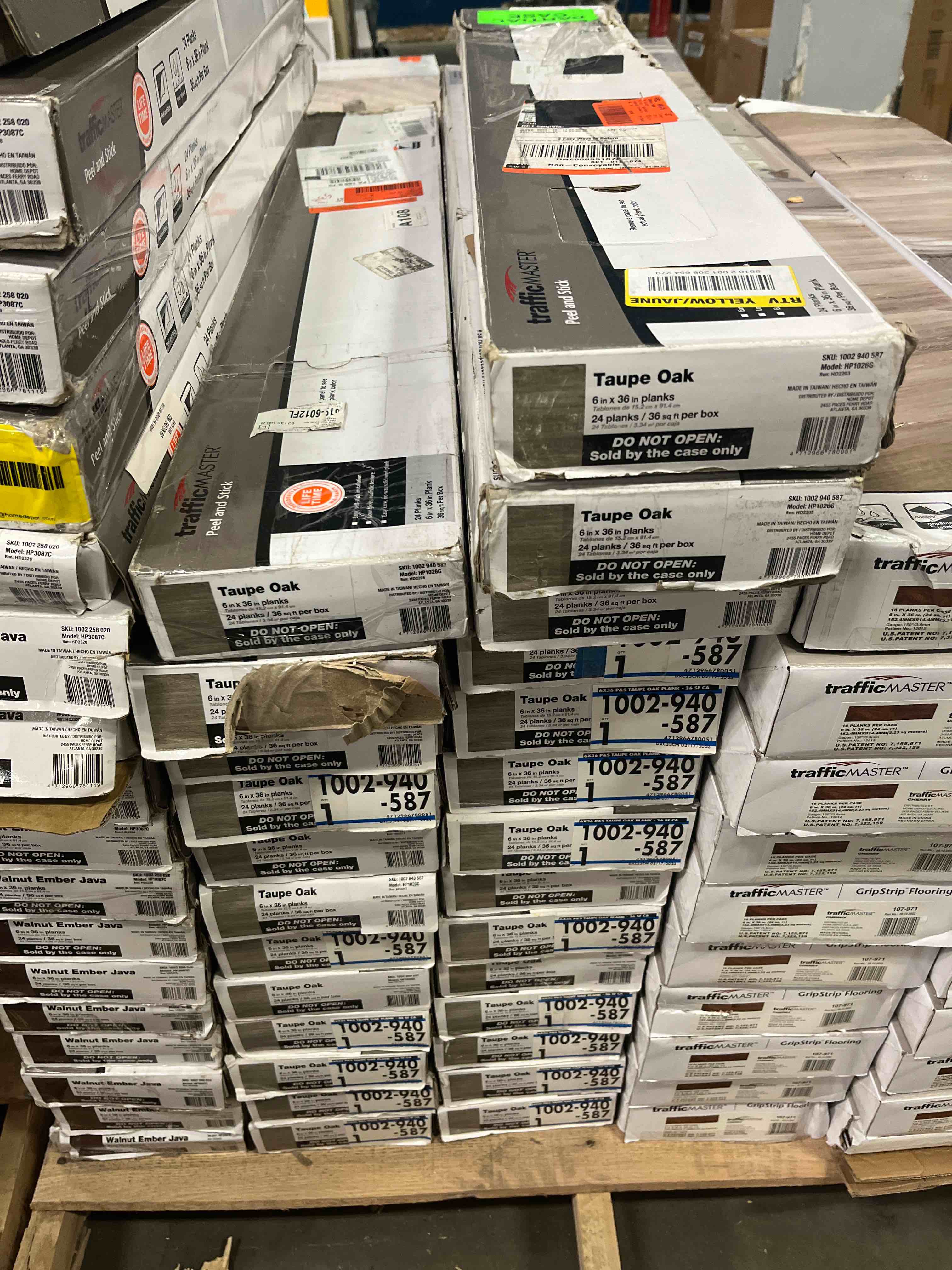 Traffic Master Taupe Oak  Peel and Stick Flooring (36 sq.ft per box ) 26 boxes for pick Up 936 sq.ft you bid per sq.ft 