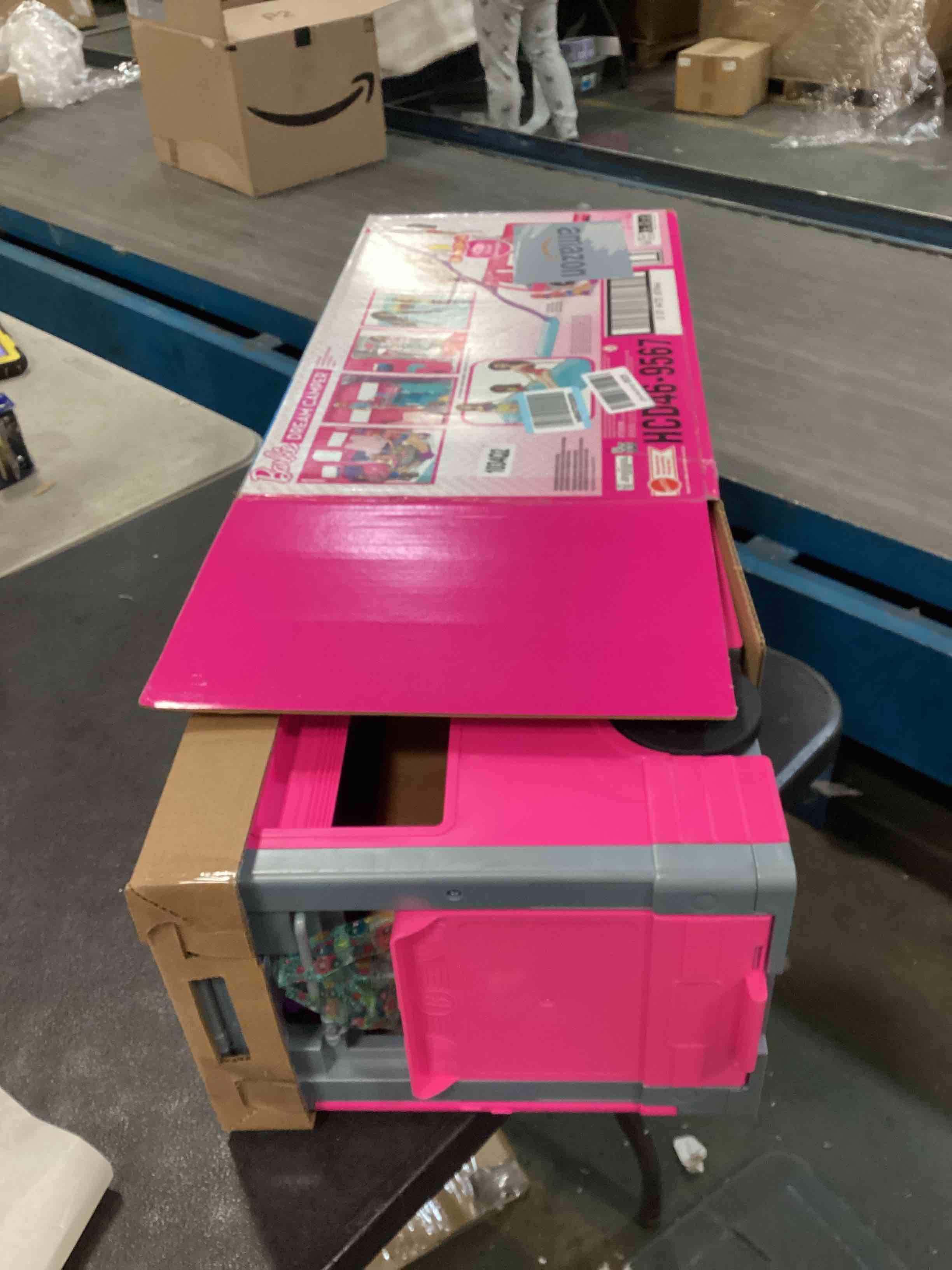 Condition photo showing Good Condition for barbie camper playset, dreamcamper toy vehicle with 60 doll-sized accessories including furniture, pool & 30-inch slide