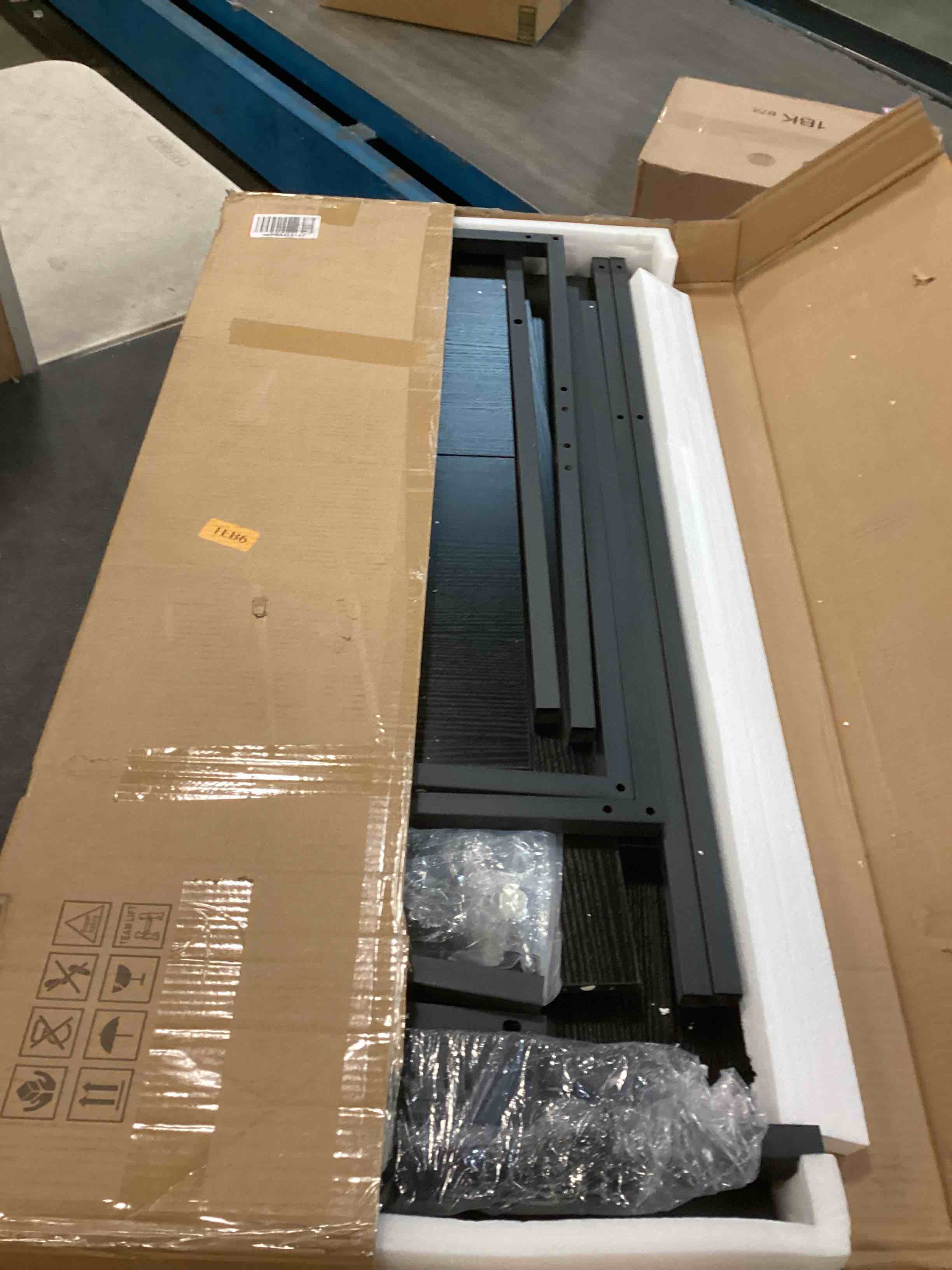 Condition photo showing Good Condition for Unikito Reversible L Shaped Desk with Magic Power Outlets and USB Charging Ports, Sturdy Corner Computer Desk with Storage Shelves, Gaming Table Home Office Desk, Easy to Assemble, Black