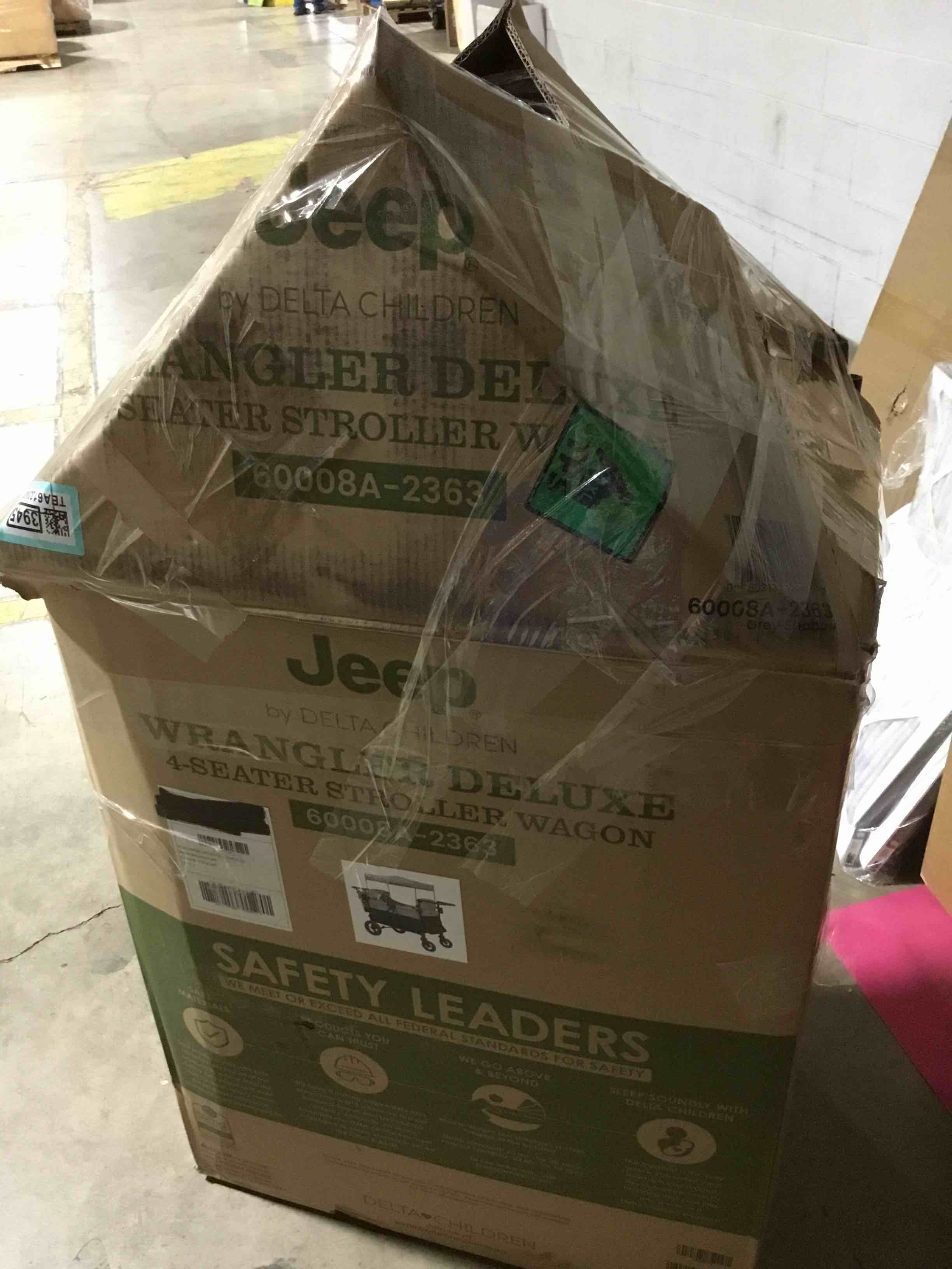 Condition photo showing As Is for (piece that keeps it open is broken should have been as is )Jeep Wrangler Deluxe 4 Seater Stroller Wagon by Delta Children - Premium Quad Stroller Wagon for 4 Kids with Convertible Seats, Adjustable Push/Pull Handles, Removable Canopy & Flat Fold, Grey