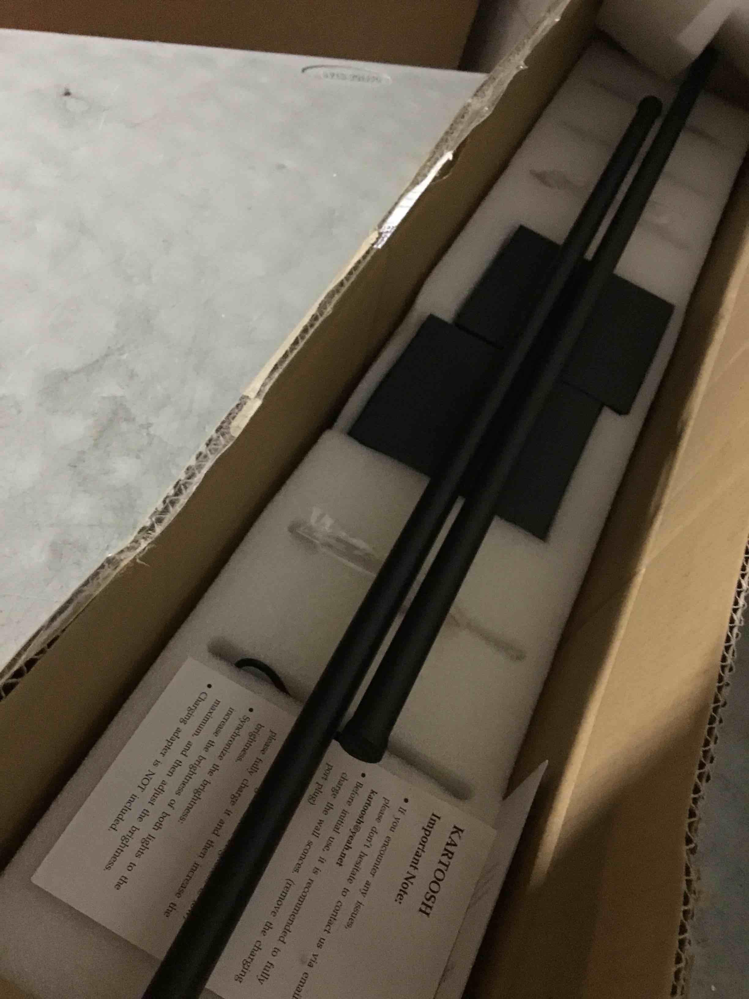 Condition photo showing As Is for (DAMAGED)28.3 Inch Battery Operated Wall Sconces 3000K Warm White LED Wall Lights Remote Control Dimmable Set of Two 350°Rotate Wireless Lamps Home Decor for Living Room Hallway Bedroom, Black 2 Pack Black 28.3 Inches