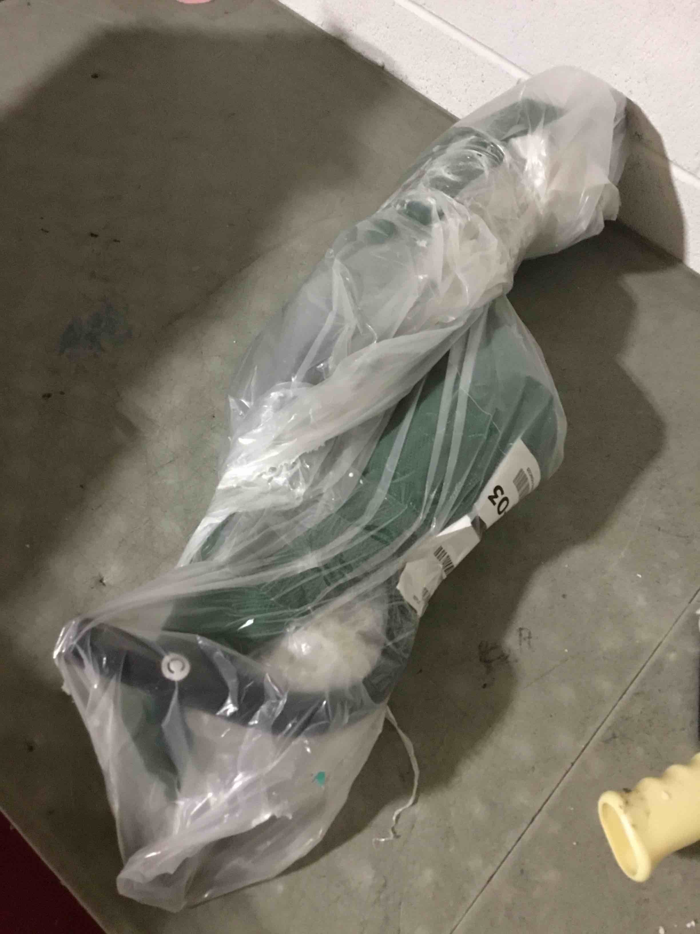 Condition photo showing As Is for Amazon Basics Cooling Breathable Elevated Dog Bed with Metal Frame for Medium Dogs, 43 x 26 x 7.5 Inch, Green Green Medium