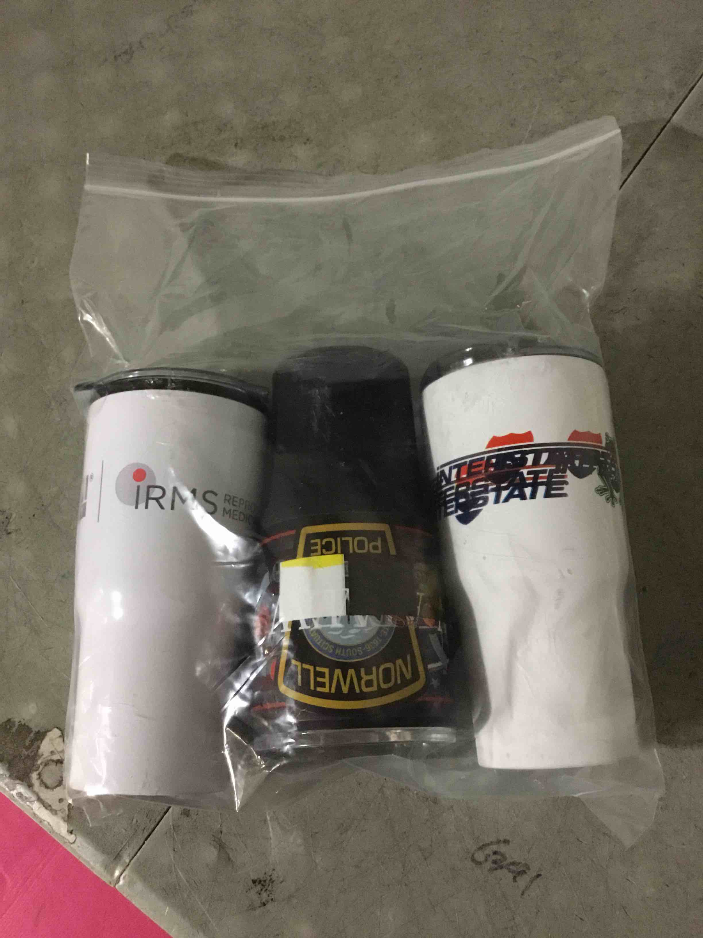 Condition photo showing As Is for (SCRATCHES) four pack of assorted stainless steel tumblers