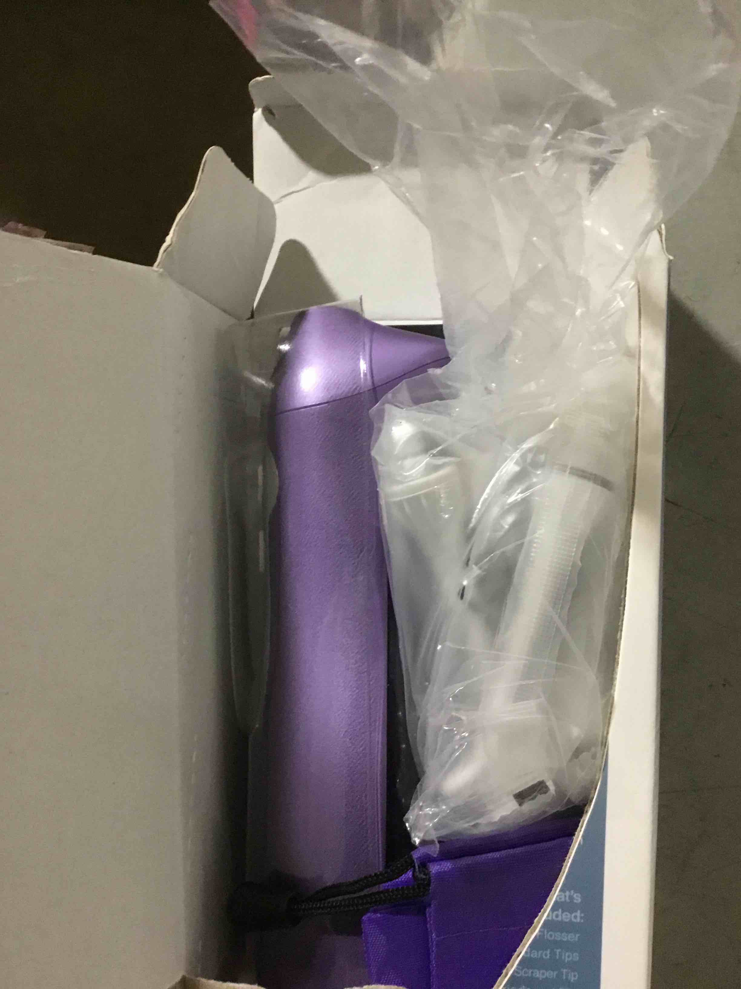 Condition photo showing As Is for aquasonic water flosser - cordless rechargeable water flossers for teeth cleaning - waterproof aqua flosser, portable oral irrigator for dental cleaning with 5 jet tips – braces home travel satin purple