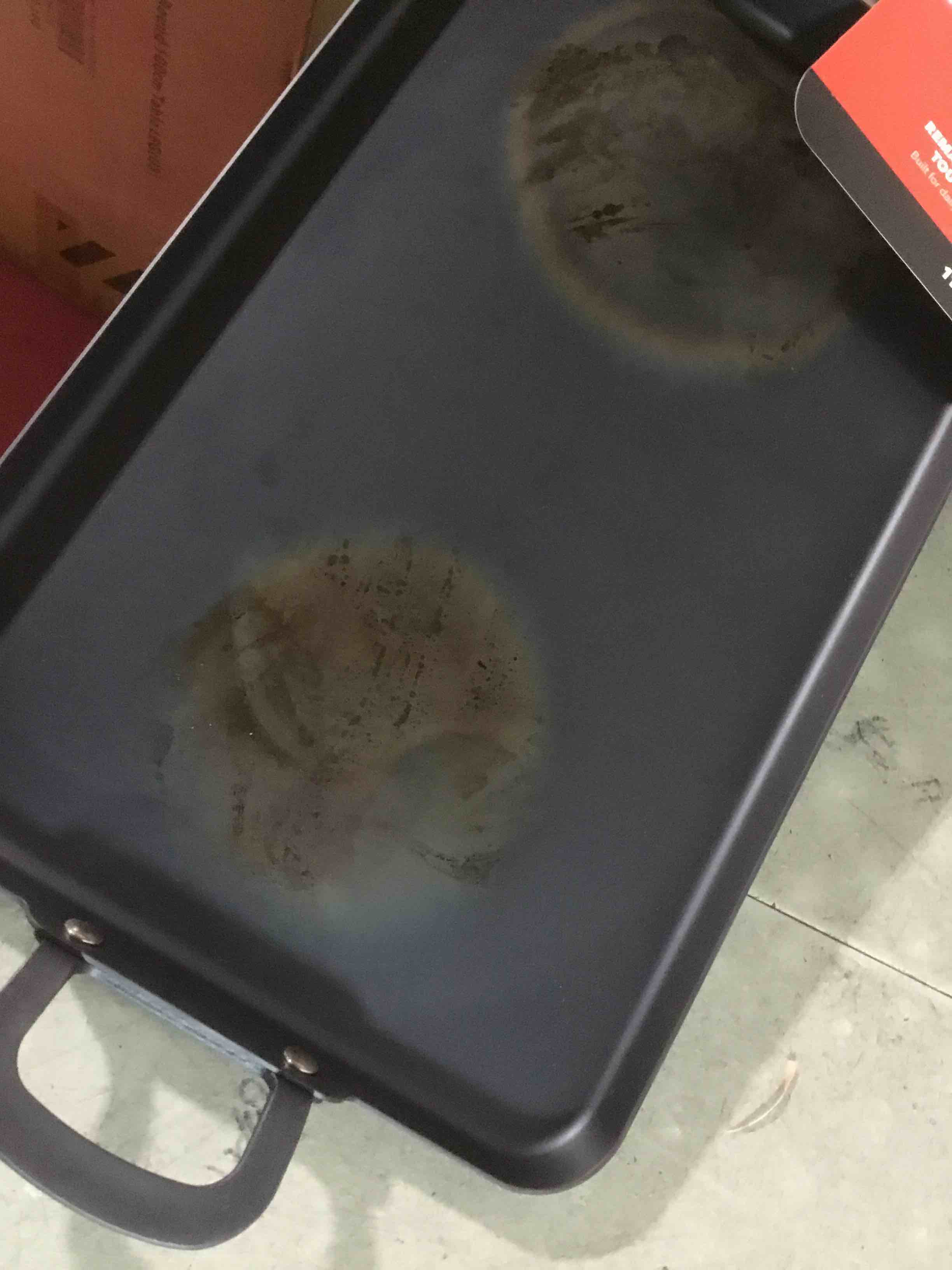 Condition photo showing As Is for (used and burn) greenpan x bobby flay 18" x 11" carbon steel double burner pan, pre-seasoned ready to use, induction compatible, high heat & oven safe durable cookware, cast iron alternative black 18" x 11" double burner griddle