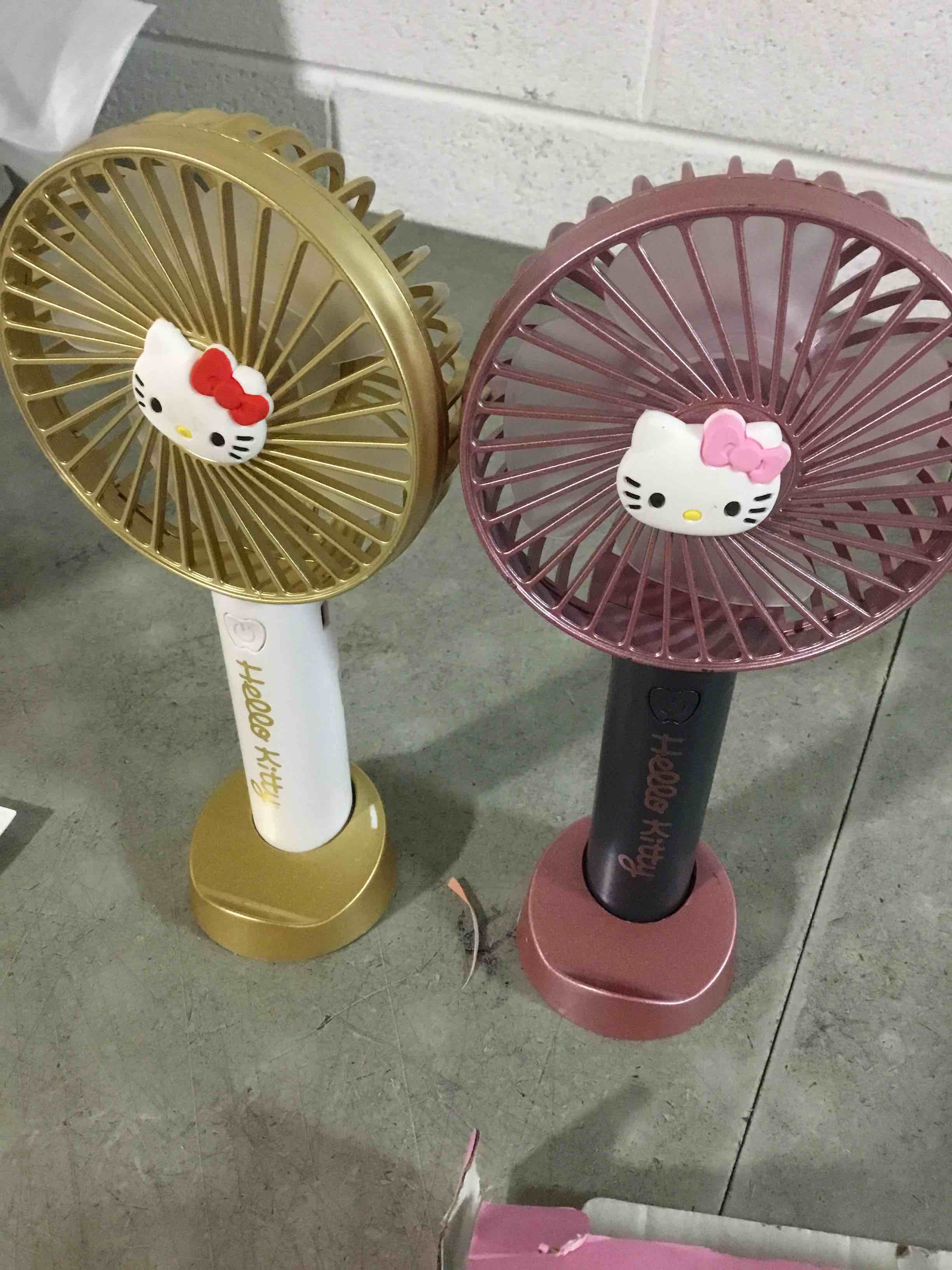 Condition photo showing Good Condition for hello kitty 2-pack handheld fan with tabletop stand - multi-speed settings, rechargeable battery, portable and compact design - ideal for home, office, and outdoor use - includes usb charging cable