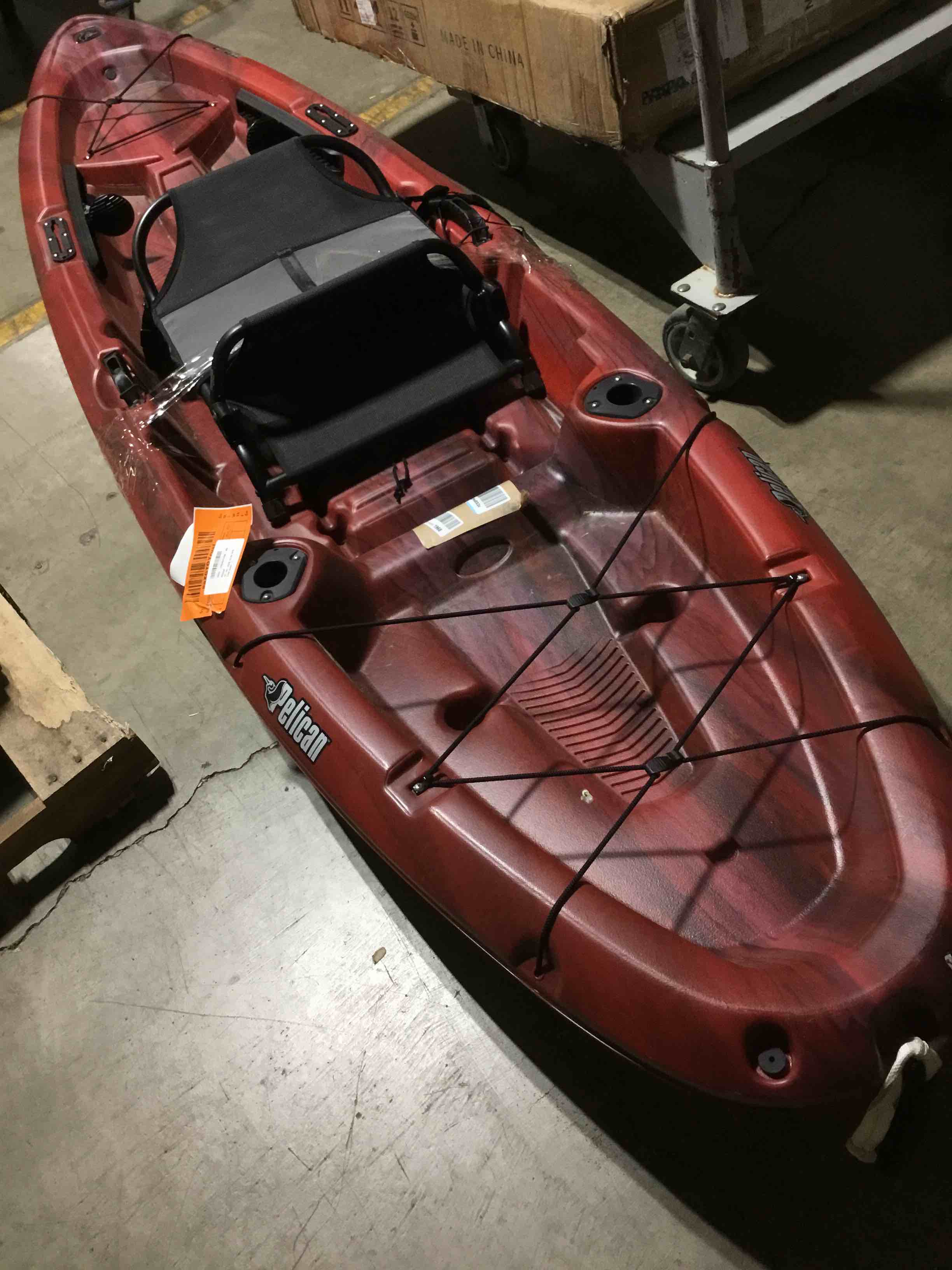Condition photo showing As Is for pelican sentinel 100xp - angler sit on top fishing kayak - lightweight - ergocast xp™ seating system - 10 ft garnet