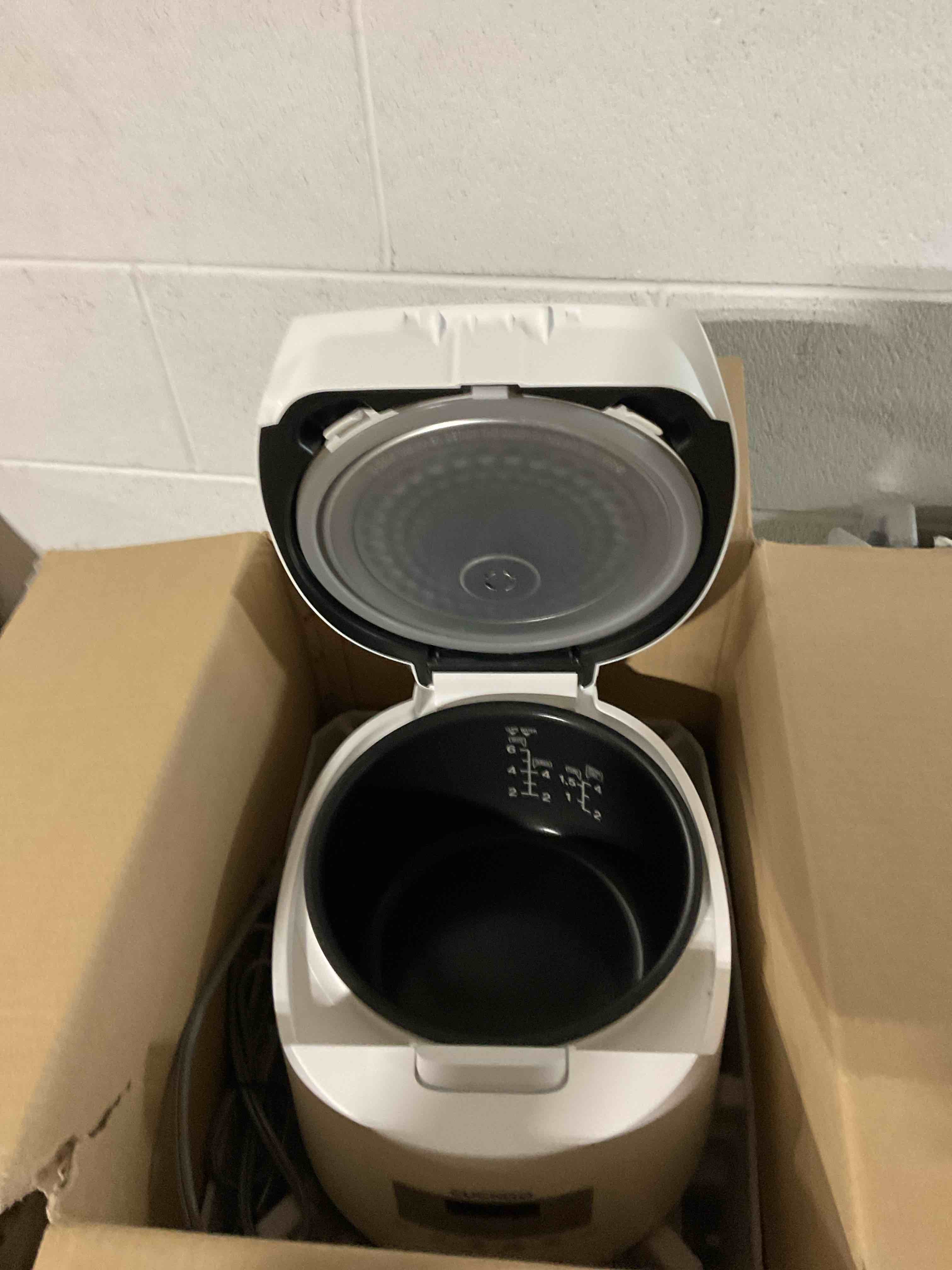 Condition photo showing As Is for 6-cup / 1.5 qt. (uncooked) micom rice cooker and warmer, steamer basket, 11 operating modes: white rice, brown rice & more, nonstick inner pot, made in korea, small rice cooker, multi cooker, cr-0641f
