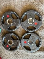 case of 4, Barbell Weight Plates, 1-10Lbs., 2-5Lbs. 1-2.5Lbs and clip weight dumbbell 