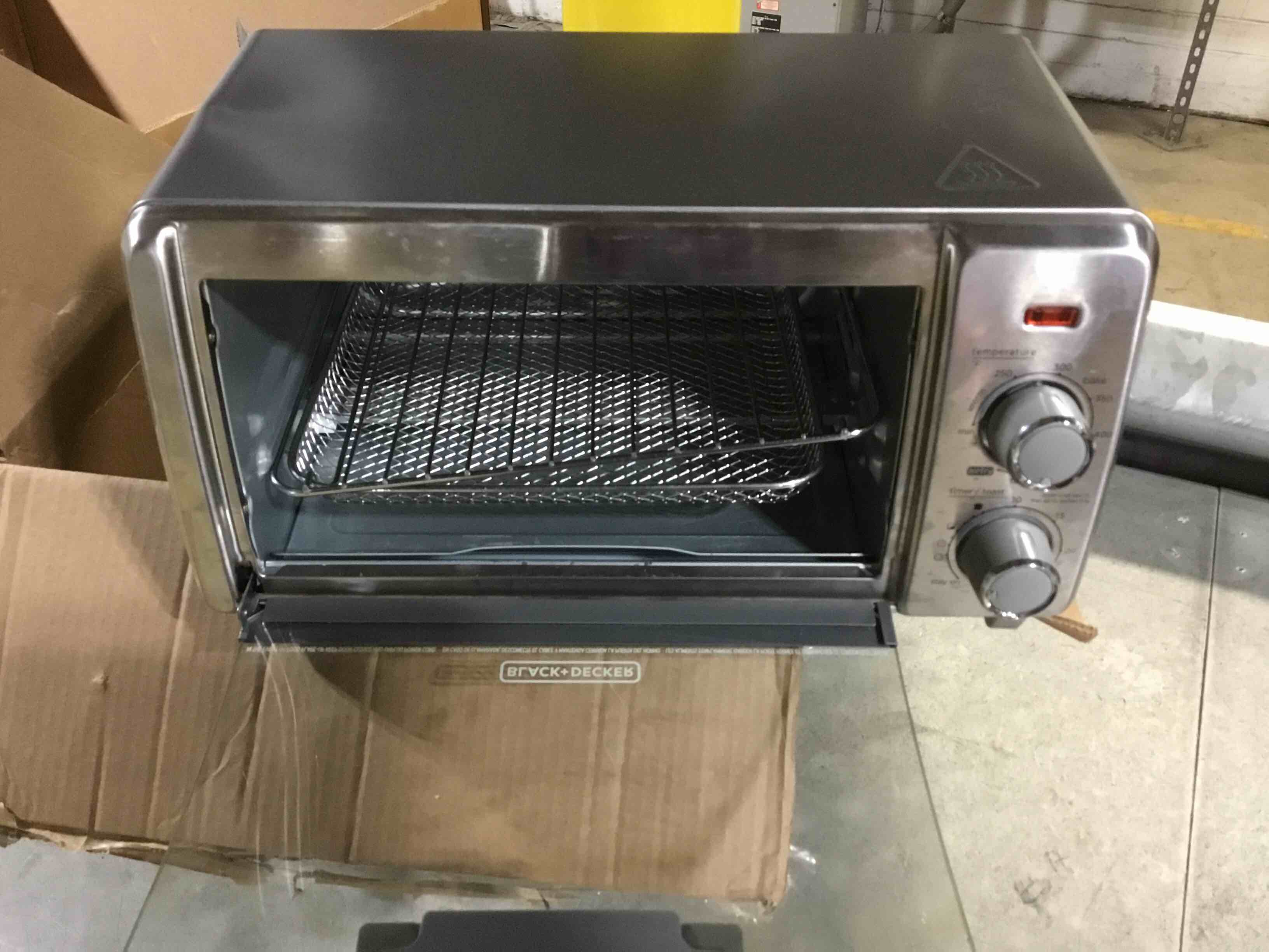 Condition photo showing As Is for BLACK+DECKER Crisp 'N Bake Air Fry Countertop Convection Toaster Oven, Medium Capacity, 4-Slice, 5-in-1, Fits 9β Pizza, 30-Min Timer, Bake, Broil, Air Fry, Toast, Keep Warm, Stainless Steel