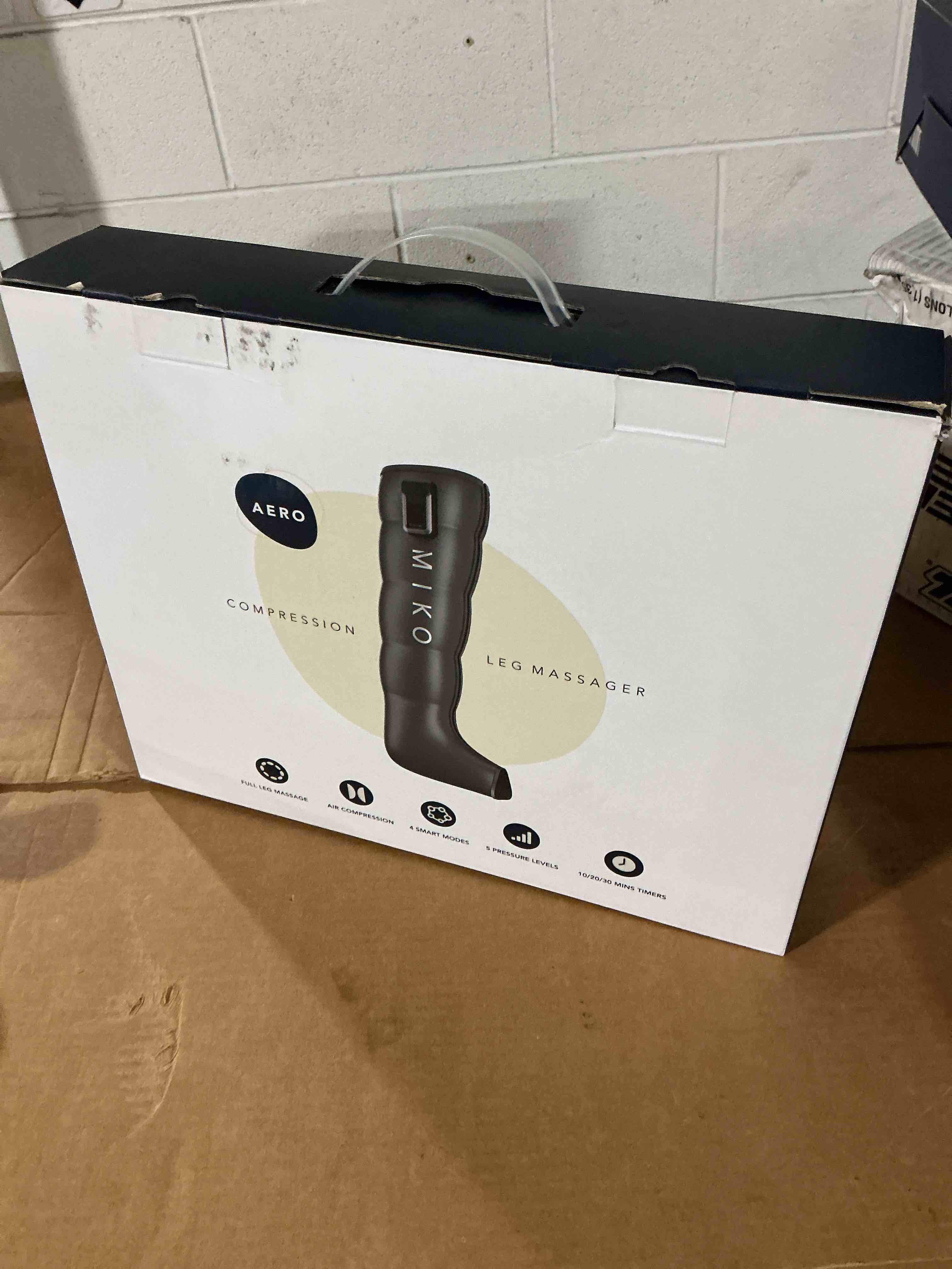 Condition photo showing New/Like New for miko compression massager with advanced airbag technology – adjustable intensity soothing heat and targeted relief for feet and legs – perfect for home and travel relaxation