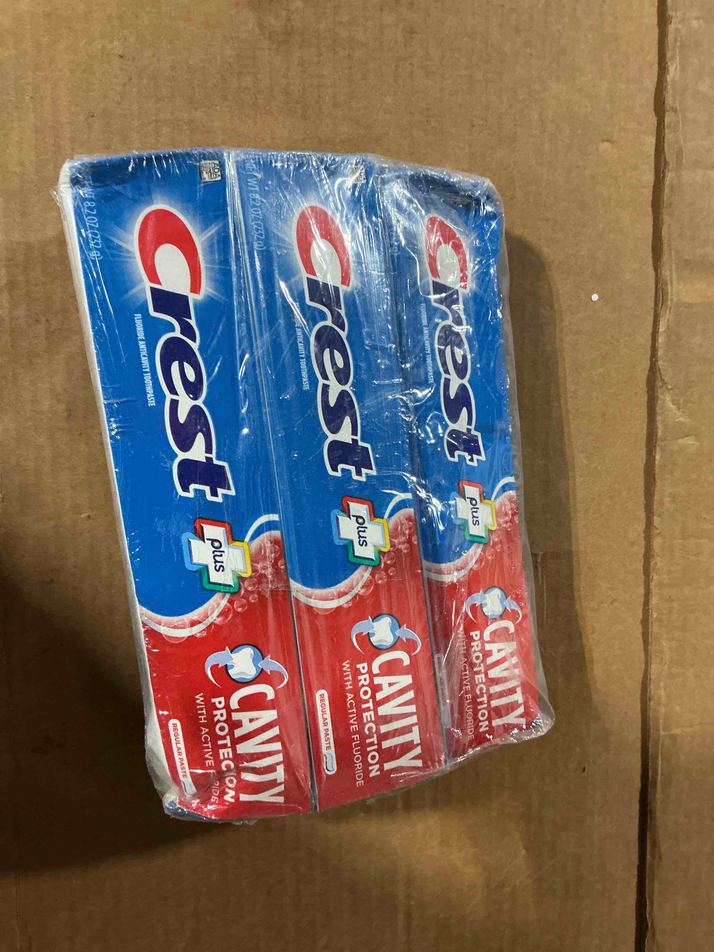 Condition photo showing New/Like New for crest cavity protection toothpaste regular - 8.2 ounce (pack of 4)