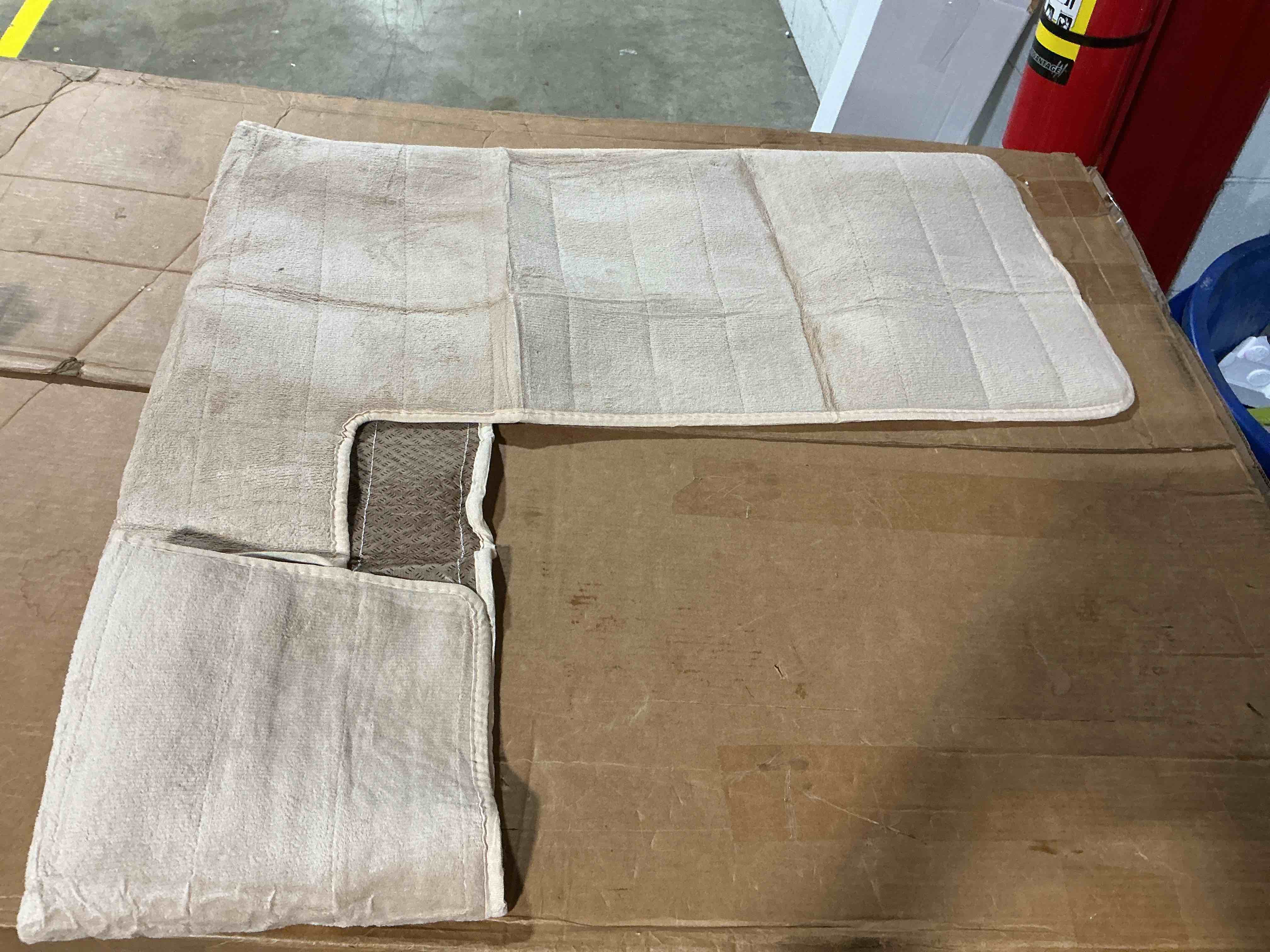 Condition photo showing Good Condition for l-shaped, custom-fitted fabric protection pad 46” l x 46” w beige