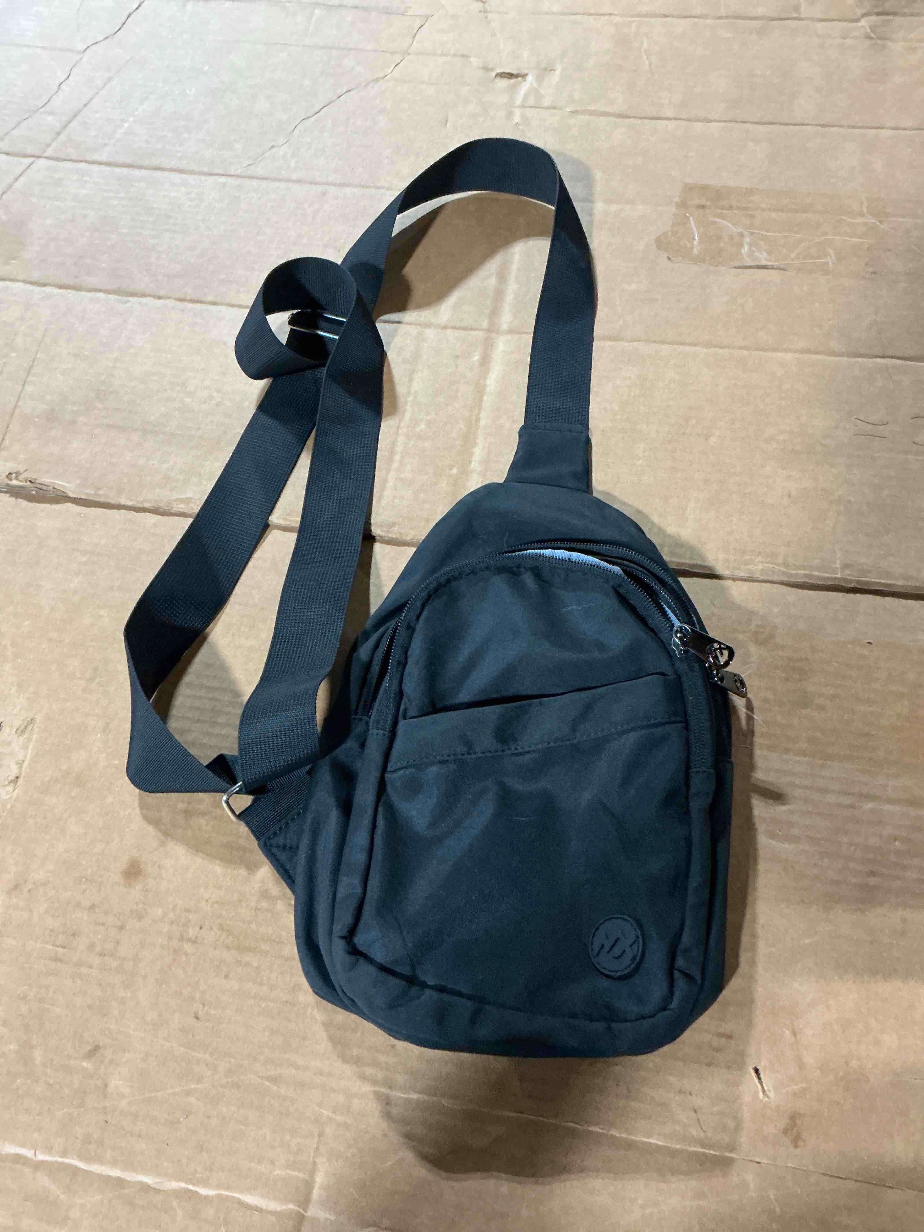 Condition photo showing As Is for nx small black sling crossbody bag, anti-theft motorcycle chest bag